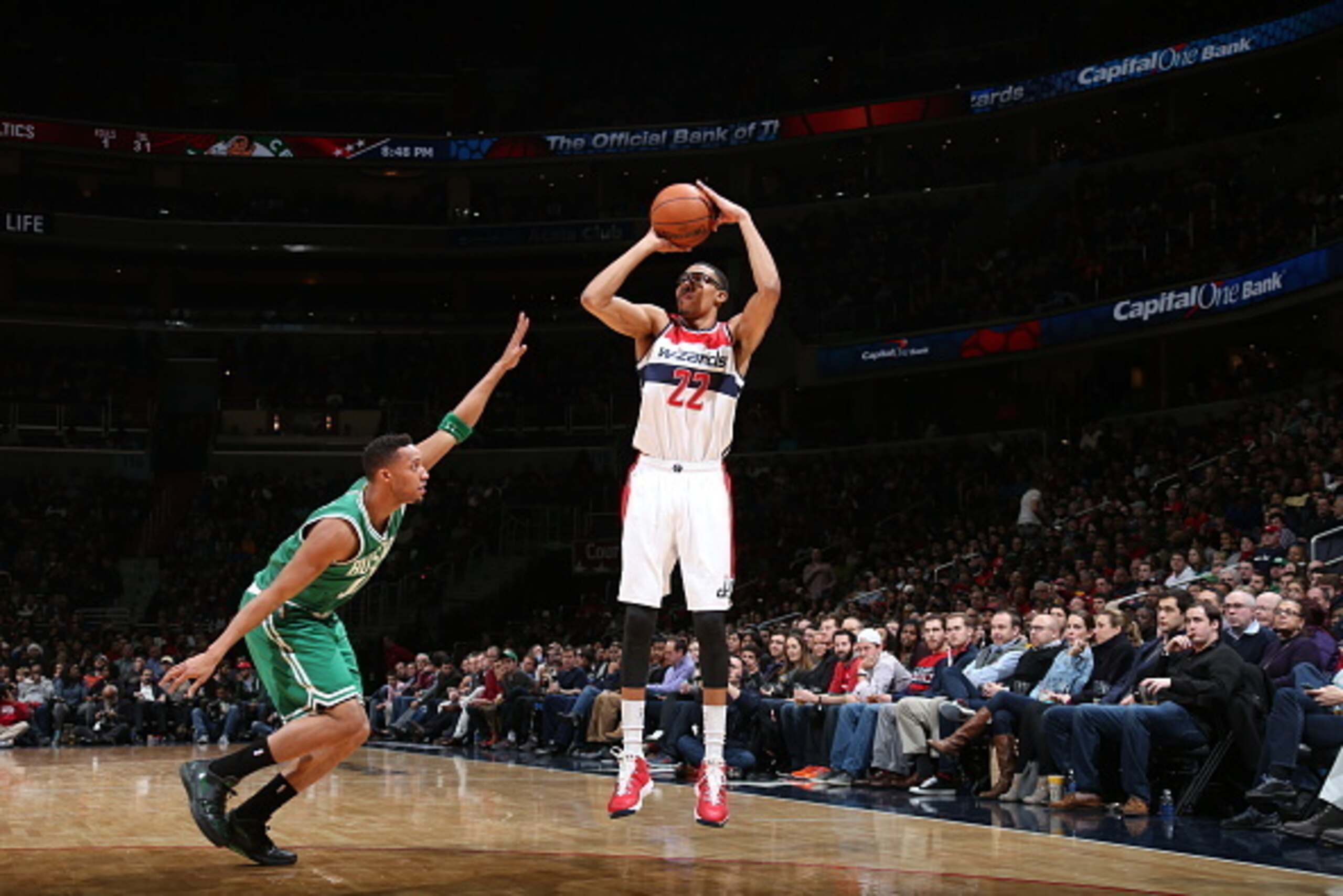 WASHINGTON, DC - DECEMBER 27: Otto Porter Jr. #22 of the Washington Wizards shoots against the Boston Celtics during the game on December 27, 2014 at Verizon Center in Washington, District of Columbia. NOTE TO USER: User expressly acknowledges and agrees 