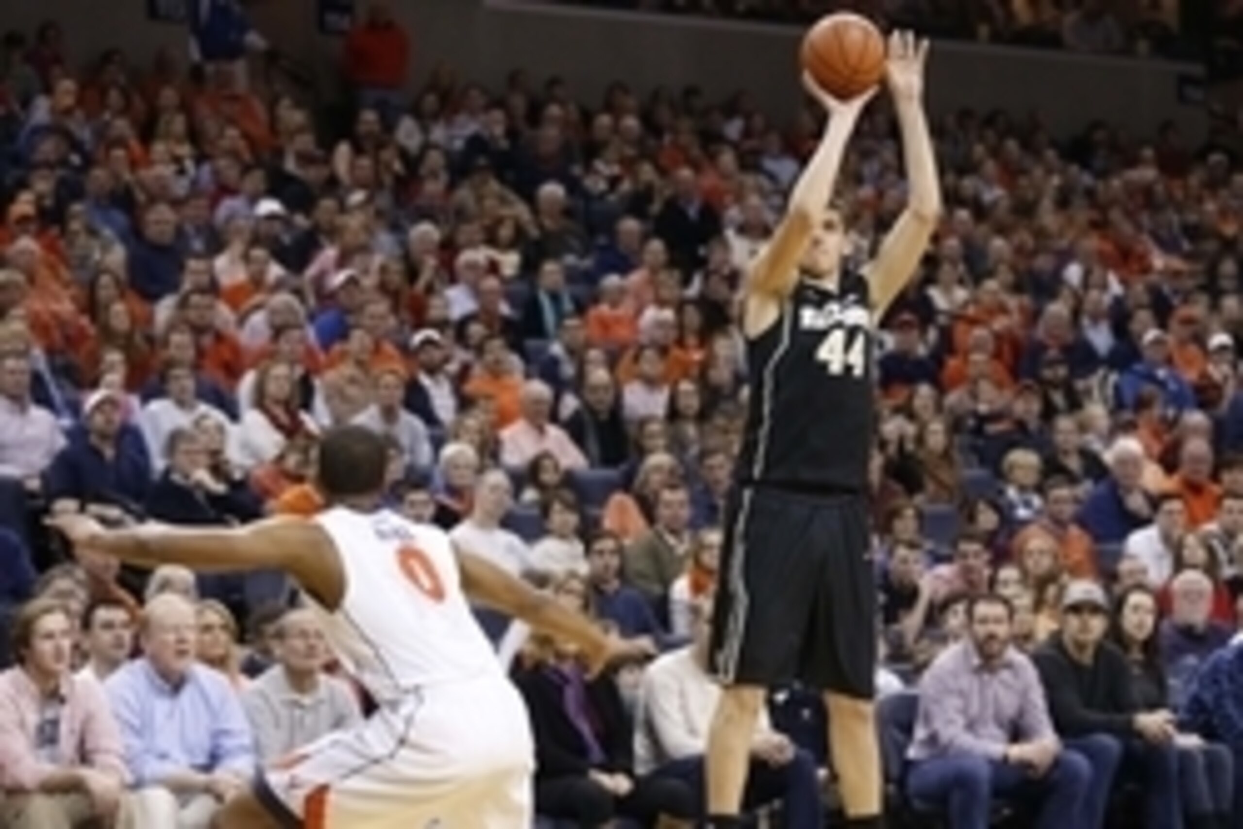 Feb 14, 2015; Charlottesville, VA, USA; Wake Forest Demon Deacons forward Konstantinos Mitoglou (44) shoots the ball over Virginia Cavaliers guard Devon Hall (0) in the first half at John Paul Jones Arena. Mandatory Credit: Geoff Burke-USA TODAY Sports Feb 14, 2015; Charlottesville, VA, USA; Wake Forest Demon Deacons forward Konstantinos Mitoglou (44) shoots the ball over Virginia Cavaliers guard Devon Hall (0) in the first half at John Paul Jones Arena. Mandatory Credit: Geoff Burke-USA TODAY Sports