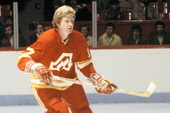 MONTREAL 1980's: Garry Unger #7 of the Atlanta Flames skates against the Montreal Canadiens in the 1980's at the Montreal Forum in Montreal, Quebec, Canada. (Photo by Denis Brodeur/NHLI via Getty Images)