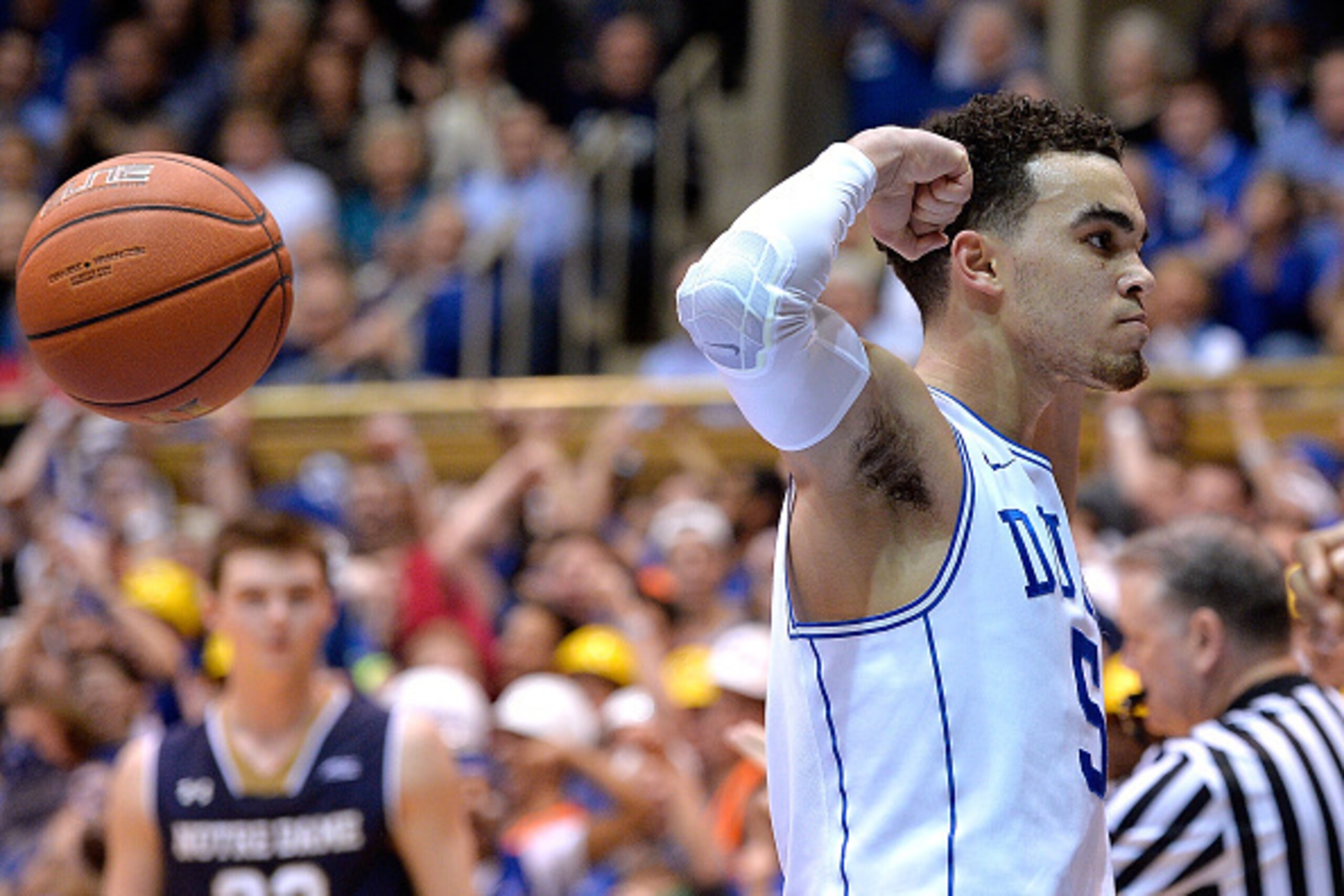 DURHAM, NC - FEBRUARY 07:  Tyus Jones #5 of the Duke Blue Devils reacts after scoring and drawing a foul against the Notre Dame Fighting Irish during their game at Cameron Indoor Stadium on February 7, 2015 in Durham, North Carolina.  (Photo by Grant Halv
