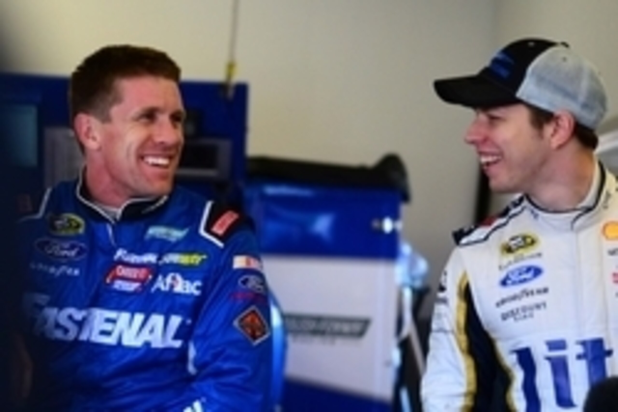Feb 14, 2014; Daytona Beach, FL, USA; NASCAR Sprint Cup Series driver Carl Edwards (left) and Brad Keselowski during practice for the Sprint Unlimited at Daytona International Speedway. Mandatory Credit: Andrew Weber-USA TODAY Sports