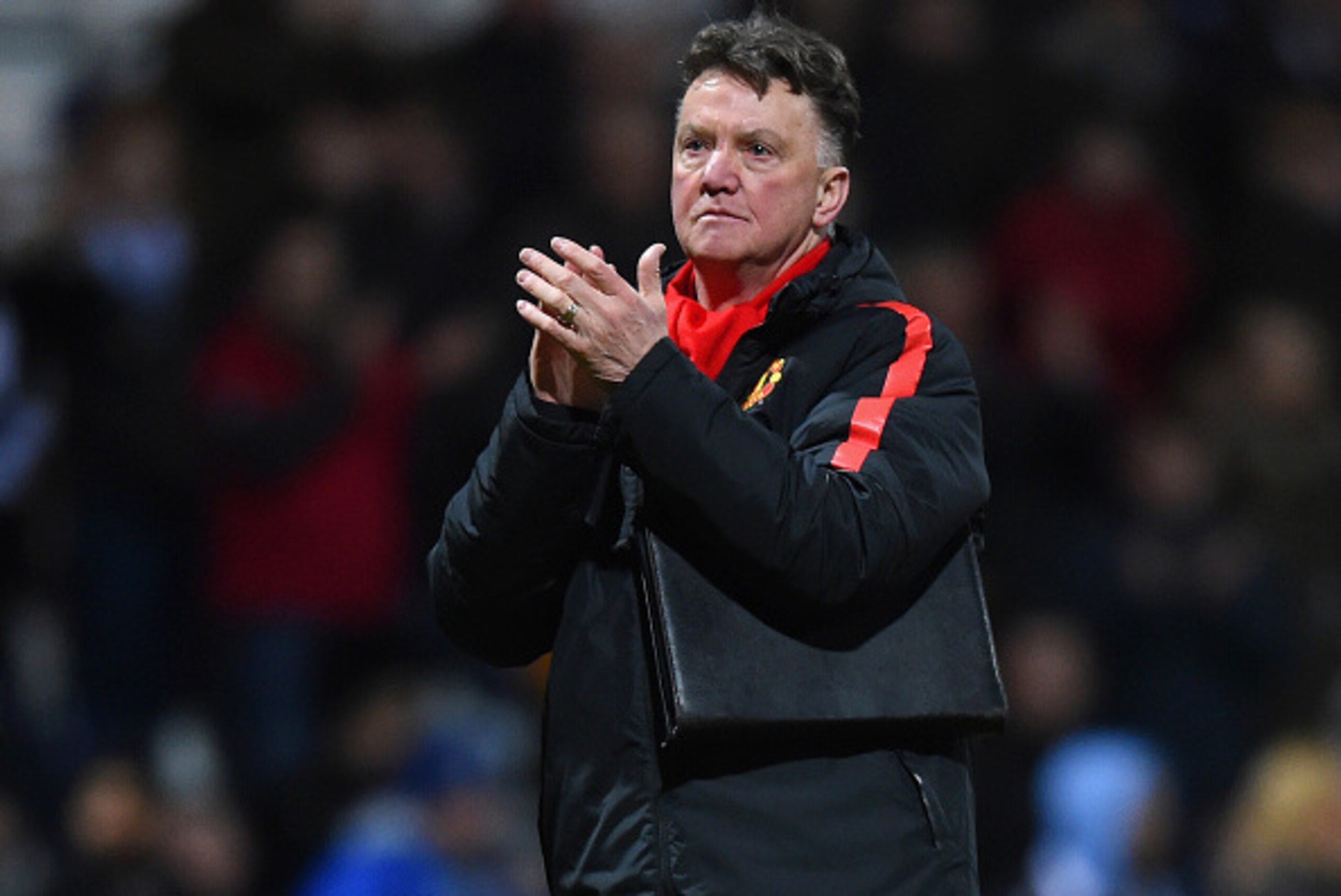PRESTON, ENGLAND - FEBRUARY 16: Manager Louis van Gaal of Manchester United applauds the fans during the FA Cup Fifth round match between Preston North End and Manchester United at Deepdale on February 16, 2015 in Preston, England (Photo by Michael Rega PRESTON, ENGLAND - FEBRUARY 16: Manager Louis van Gaal of Manchester United applauds the fans during the FA Cup Fifth round match between Preston North End and Manchester United at Deepdale on February 16, 2015 in Preston, England (Photo by Michael Rega