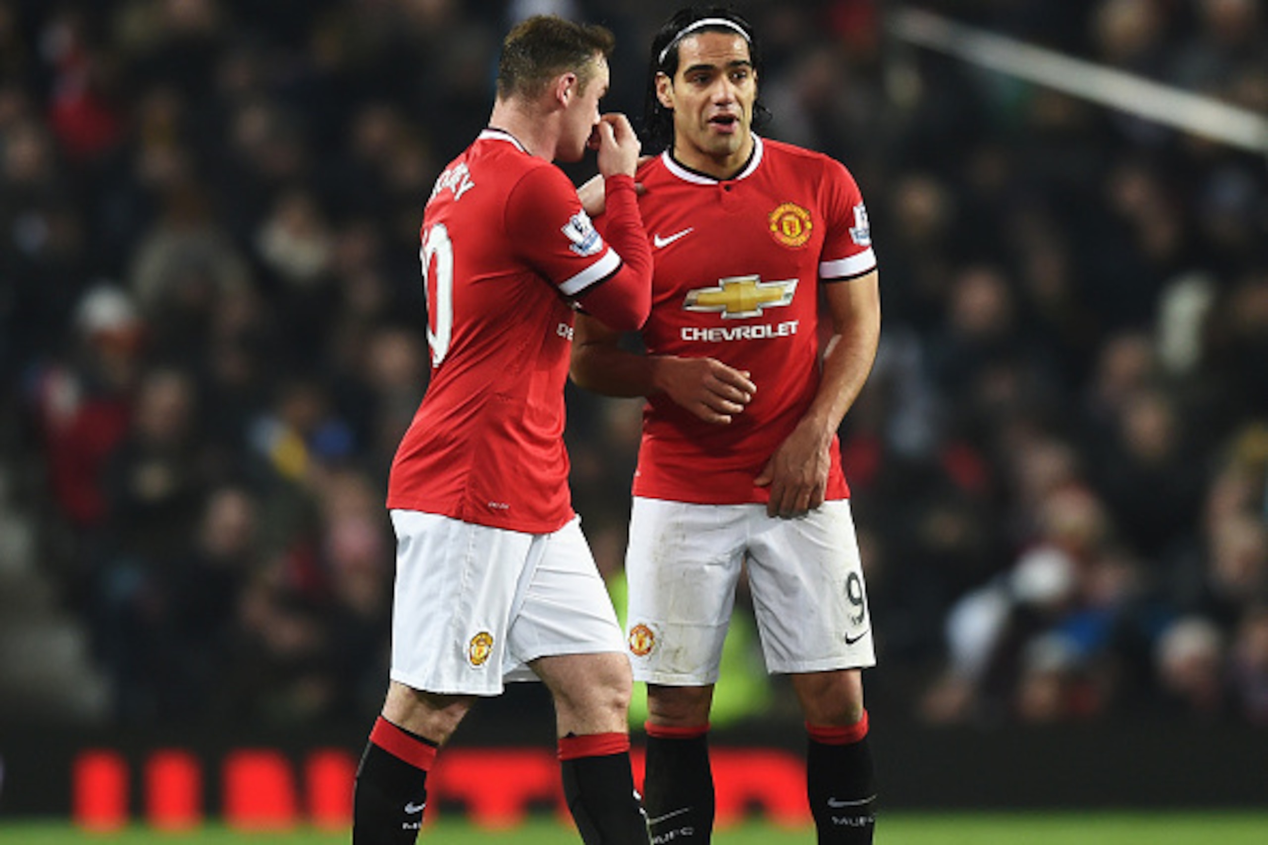 MANCHESTER, ENGLAND - FEBRUARY 11: Wayne Rooney of Manchester United talks to Radamel Falcao during the Barclays Premier League match between Manchester United and Burnley at Old Trafford on February 11, 2015 in Manchester, England. (Photo by Michael Re MANCHESTER, ENGLAND - FEBRUARY 11: Wayne Rooney of Manchester United talks to Radamel Falcao during the Barclays Premier League match between Manchester United and Burnley at Old Trafford on February 11, 2015 in Manchester, England. (Photo by Michael Re