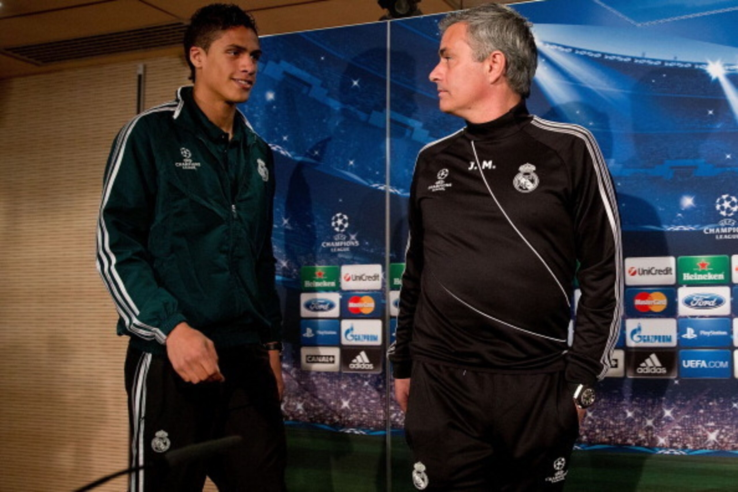 MADRID, SPAIN - APRIL 02:  Head coach Jose Mourinho (R) and Real madrid player Raphael varane prior to start a press conference ahead of the UEFA Champions League Quarterfinal match between Real Madrid and Galatasaray AS at Santiago Bernabeu Stadium on Ap