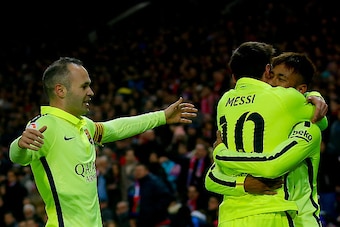 MADRID, SPAIN - JANUARY 28:  Neymar JR. of FC Barcelona embraces his teammate Lionel Messi (2ndL) celebrating scoring their third goal as Andres Iniesta (L) approaches them during the Copa del Rey Round of 8 second leg match between Club Atletico de Madri