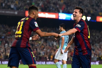 BARCELONA, SPAIN - OCTOBER 18:  Lionel Messi of FC Barcelona celebrates with his teammate Neymar of FC Barcelona after scoring his team's third goal during the La Liga match between FC Barcelona and SD Eibar at Camp Nou on October 18, 2014 in Barcelona, S