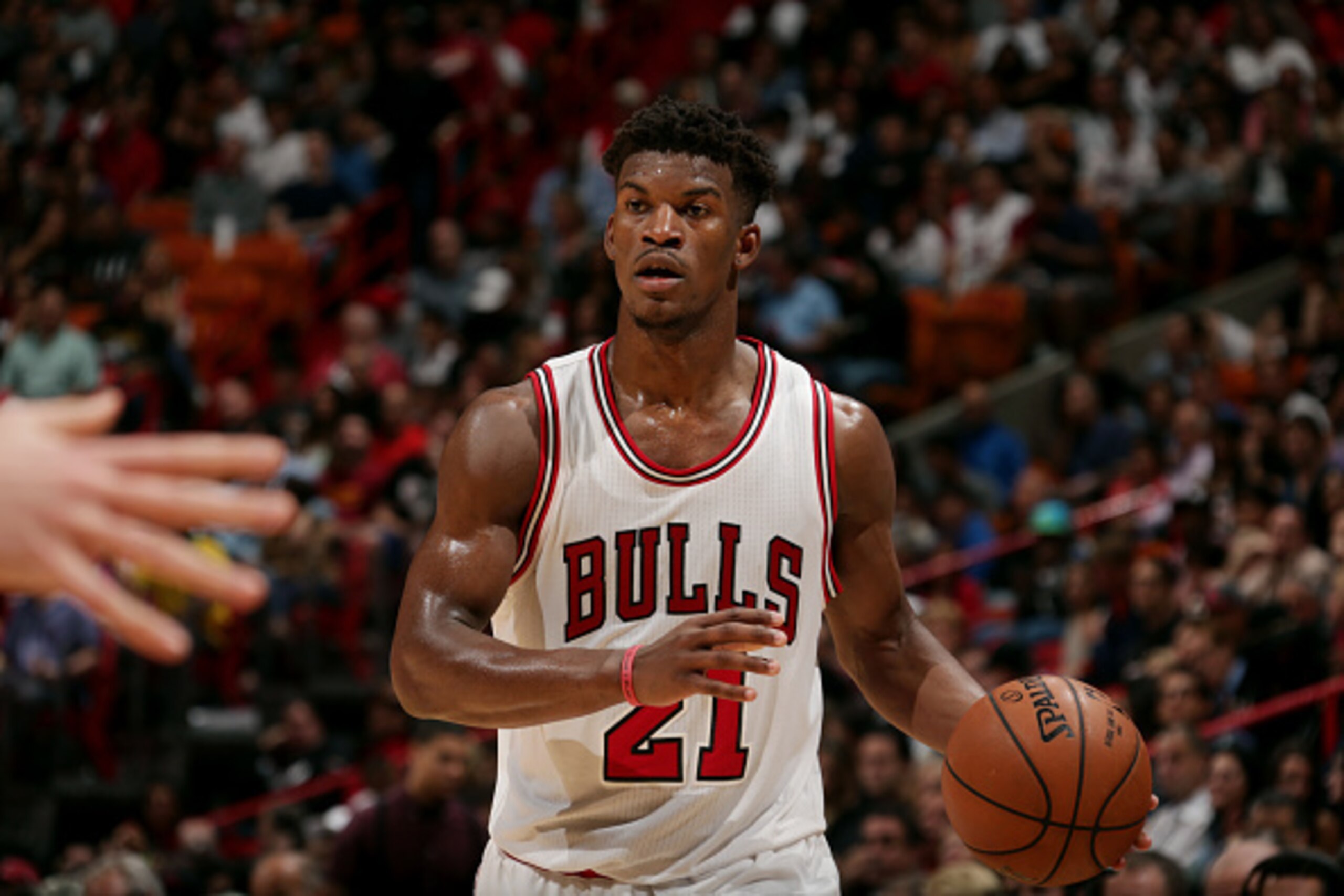 MIAMI, FL - December 14: Jimmy Butler #21 of the Chicago Bulls handles the ball against the Miami Heat on December 14, 2014 at American Airlines Arena in Miami, Florida. NOTE TO USER: User expressly acknowledges and agrees that, by downloading and or usin
