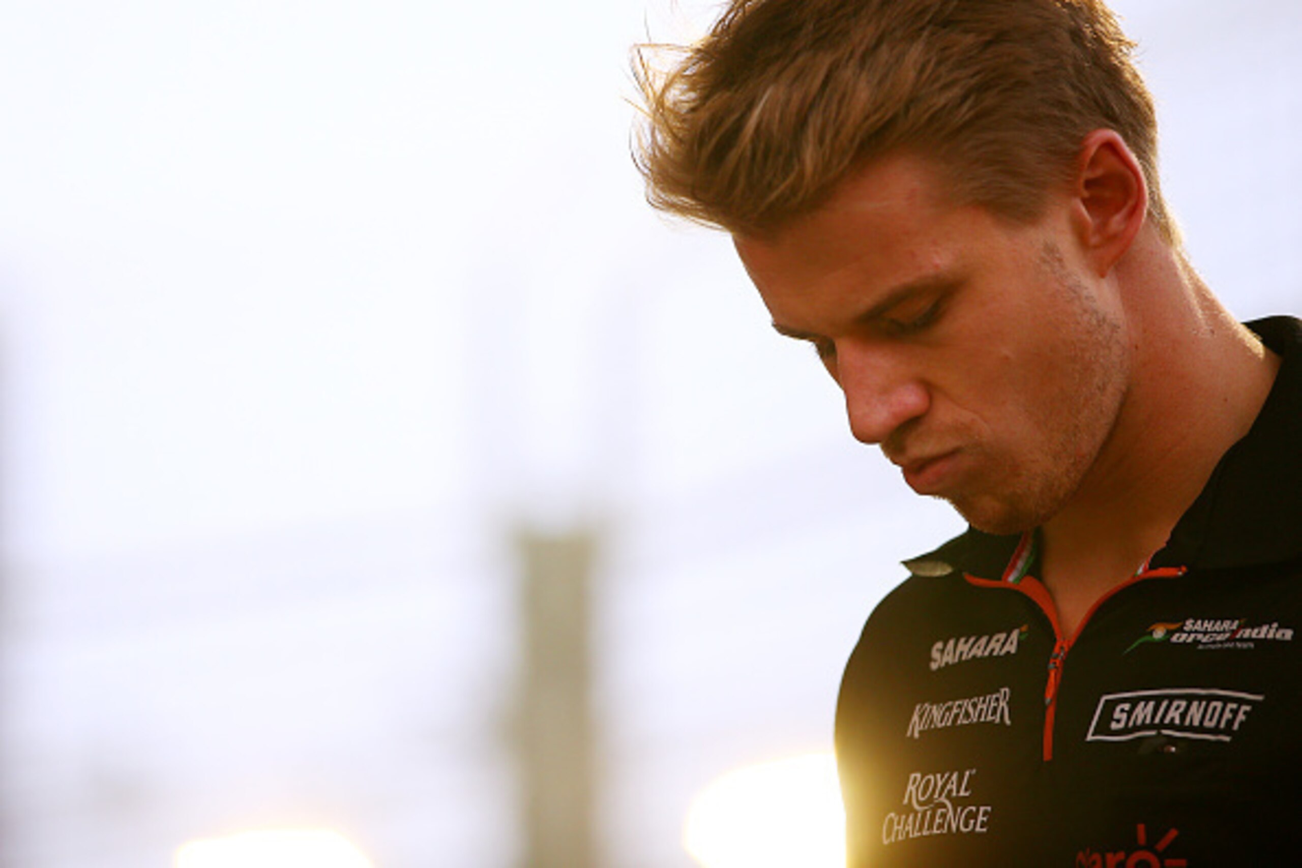SINGAPORE - SEPTEMBER 21:  Nico Hulkenberg of Germany and Force India arrives for the drivers' parade before the Singapore Formula One Grand Prix at Marina Bay Street Circuit on September 21, 2014 in Singapore, Singapore.  (Photo by Mark Thompson/Getty Im