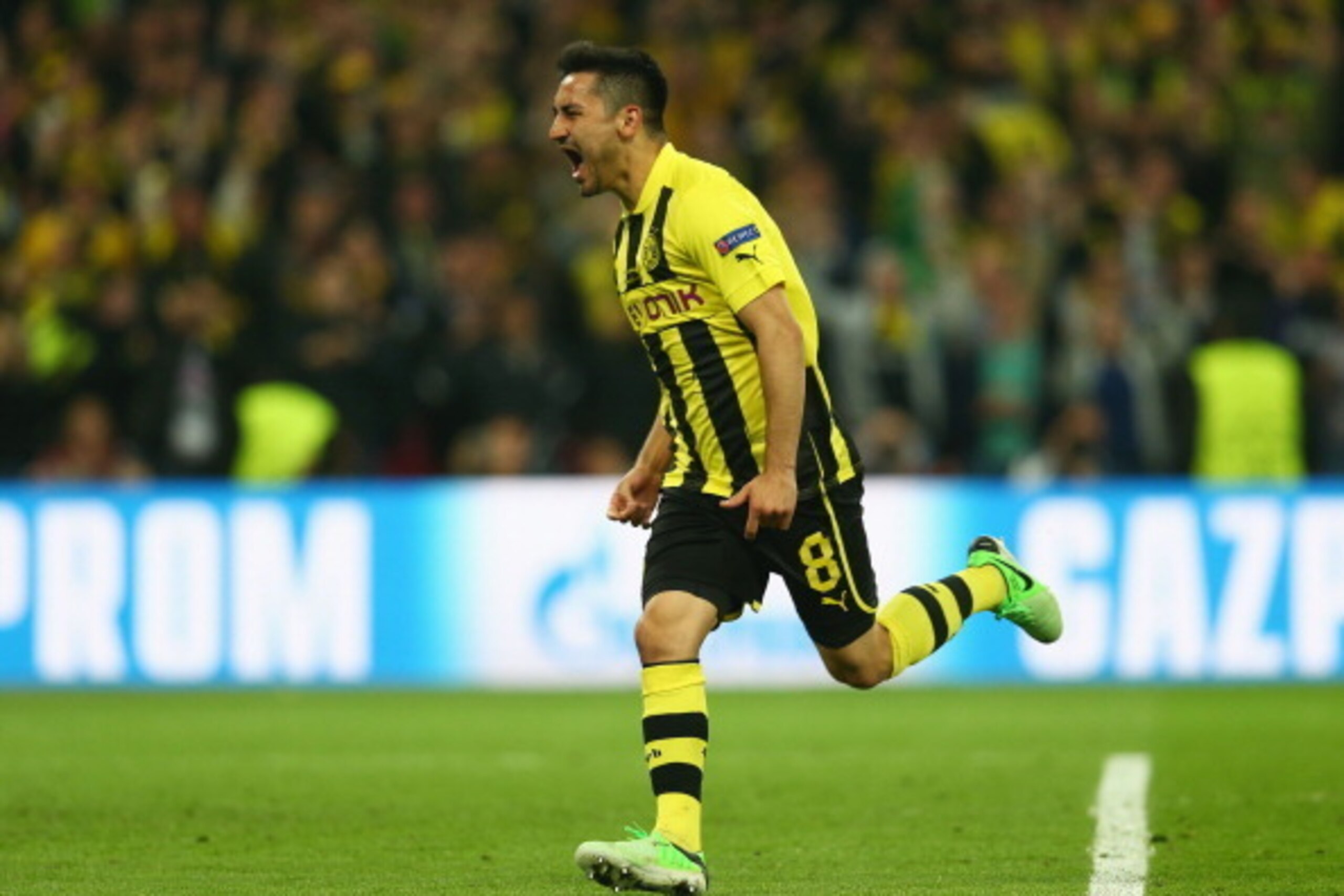LONDON, ENGLAND - MAY 25: Ilkay Gundogan of Borussia Dortmund celebrates after scoring a goal from the penalty spot during the UEFA Champions League final match between Borussia Dortmund and FC Bayern Muenchen at Wembley Stadium on May 25, 2013 in London LONDON, ENGLAND - MAY 25: Ilkay Gundogan of Borussia Dortmund celebrates after scoring a goal from the penalty spot during the UEFA Champions League final match between Borussia Dortmund and FC Bayern Muenchen at Wembley Stadium on May 25, 2013 in London