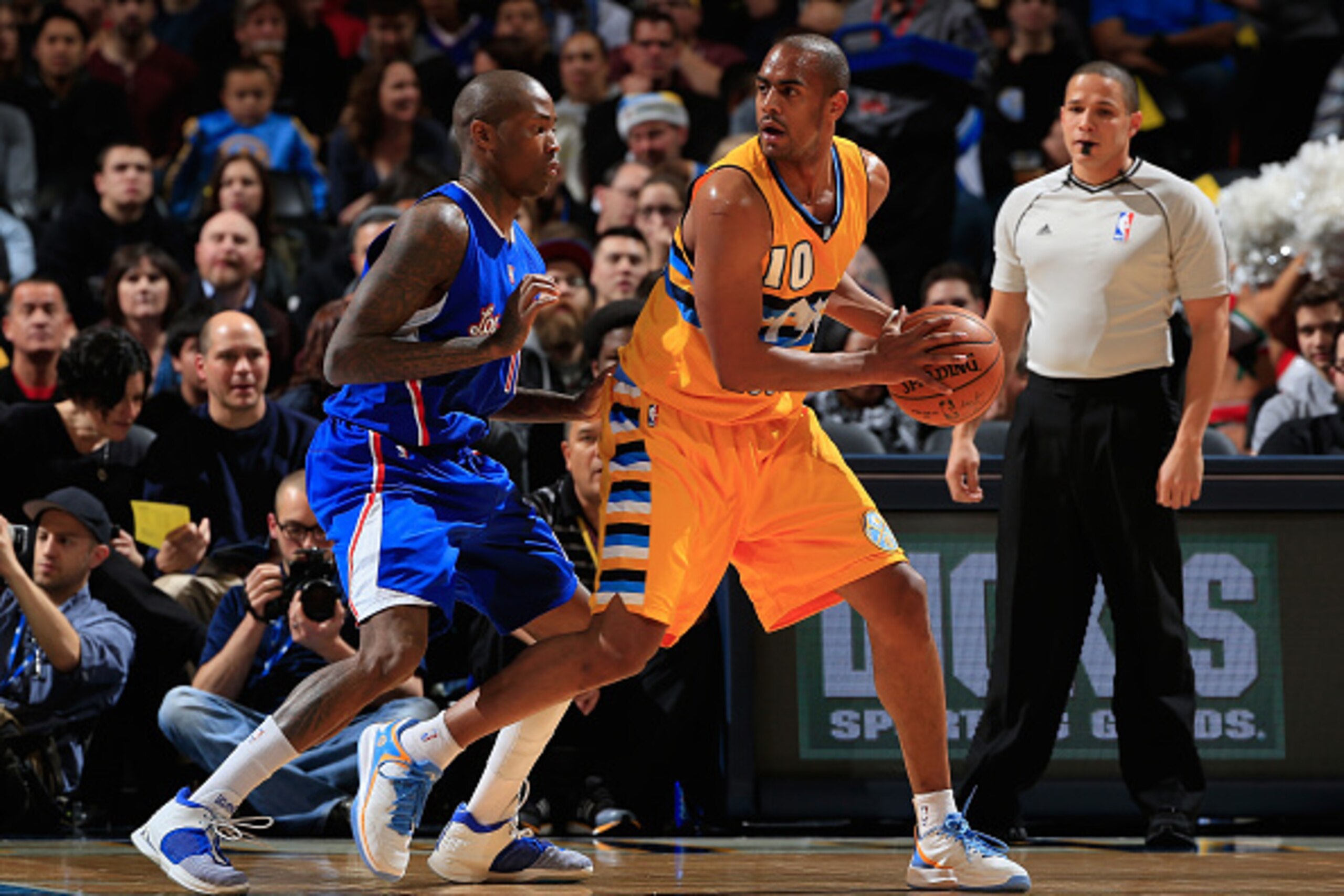 DENVER, CO - DECEMBER 19:  Arron Afflalo #10 of the Denver Nuggets controls the ball against Jamal Crawford #11 of the Los Angeles Clippers at Pepsi Center on December 19, 2014 in Denver, Colorado. The Nuggets defeated the Clippers 109-106. NOTE TO USER: 