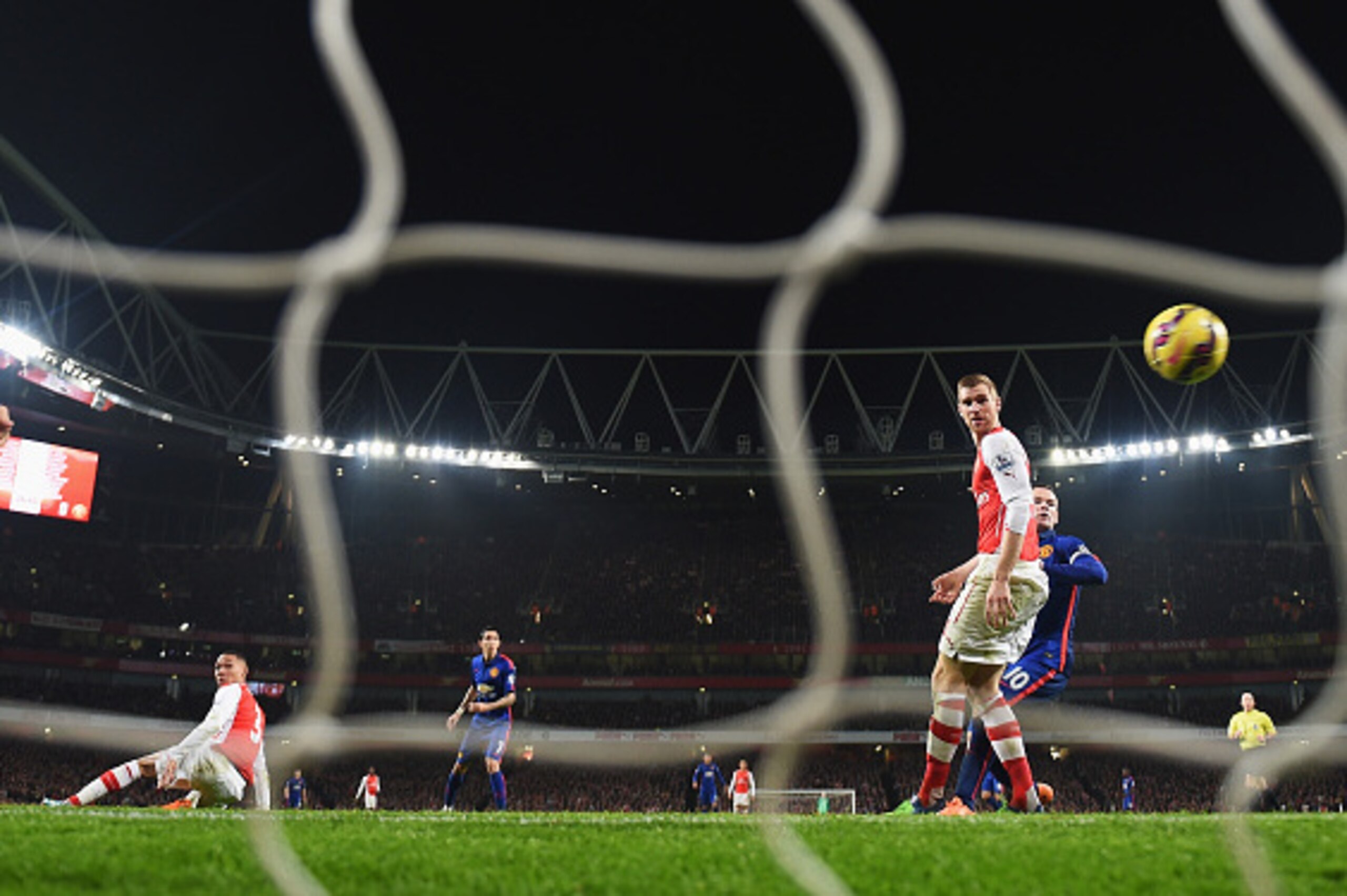 LONDON, ENGLAND - NOVEMBER 22:  Kieran Gibbs of Arsenal scores an own goal to give Manchester United the lead during the Barclays Premier League match between Arsenal and Manchester United at Emirates Stadium on November 22, 2014 in London, England.  (Pho
