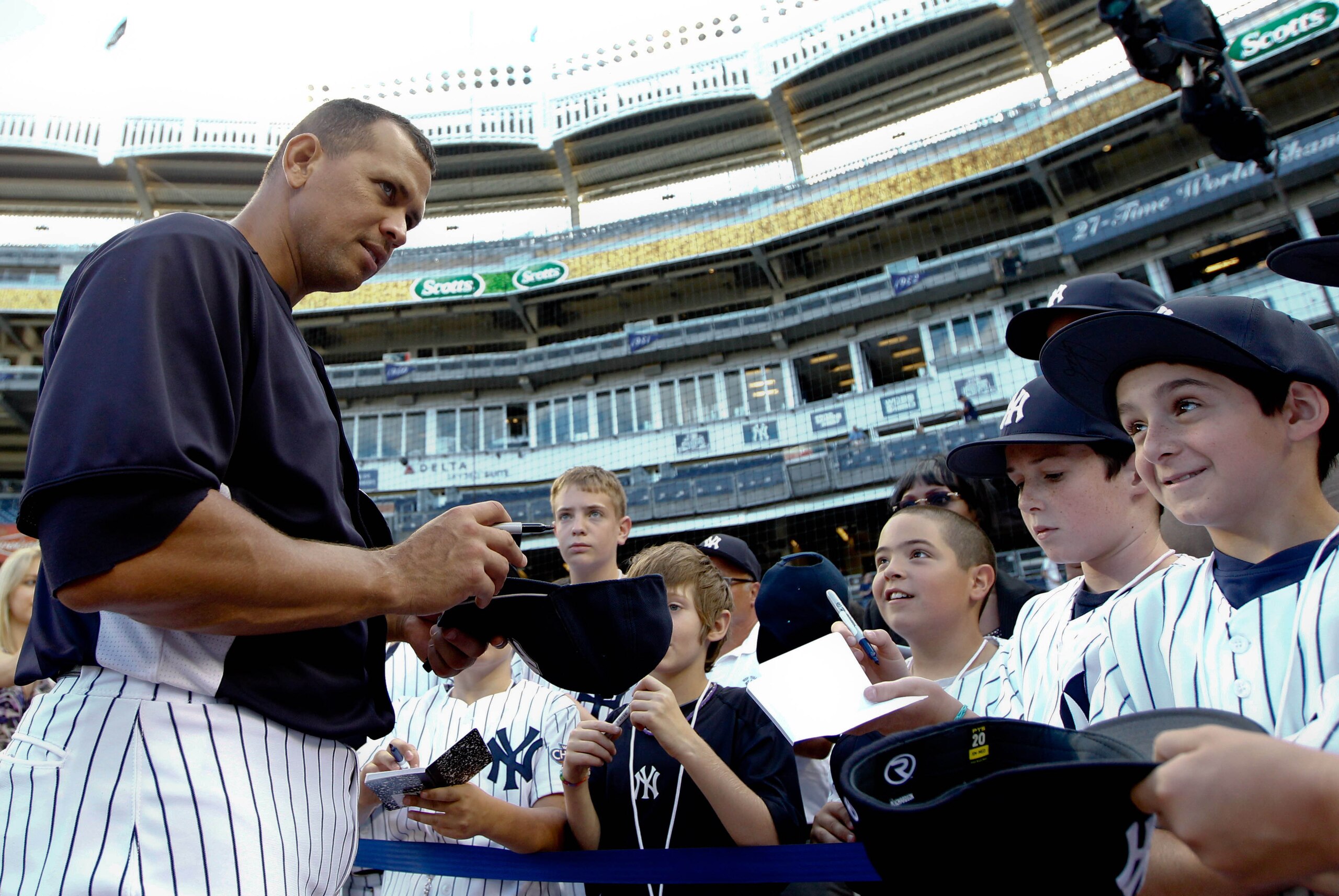 Aug 14, 2013; Bronx, NY, USA; New York Yankees third baseman Alex Rodriguez (13) signs autographs for fans before the game against the Los Angeles Angels at Yankee Stadium. Mandatory Credit: Debby Wong-USA TODAY Sports Aug 14, 2013; Bronx, NY, USA; New York Yankees third baseman Alex Rodriguez (13) signs autographs for fans before the game against the Los Angeles Angels at Yankee Stadium. Mandatory Credit: Debby Wong-USA TODAY Sports
