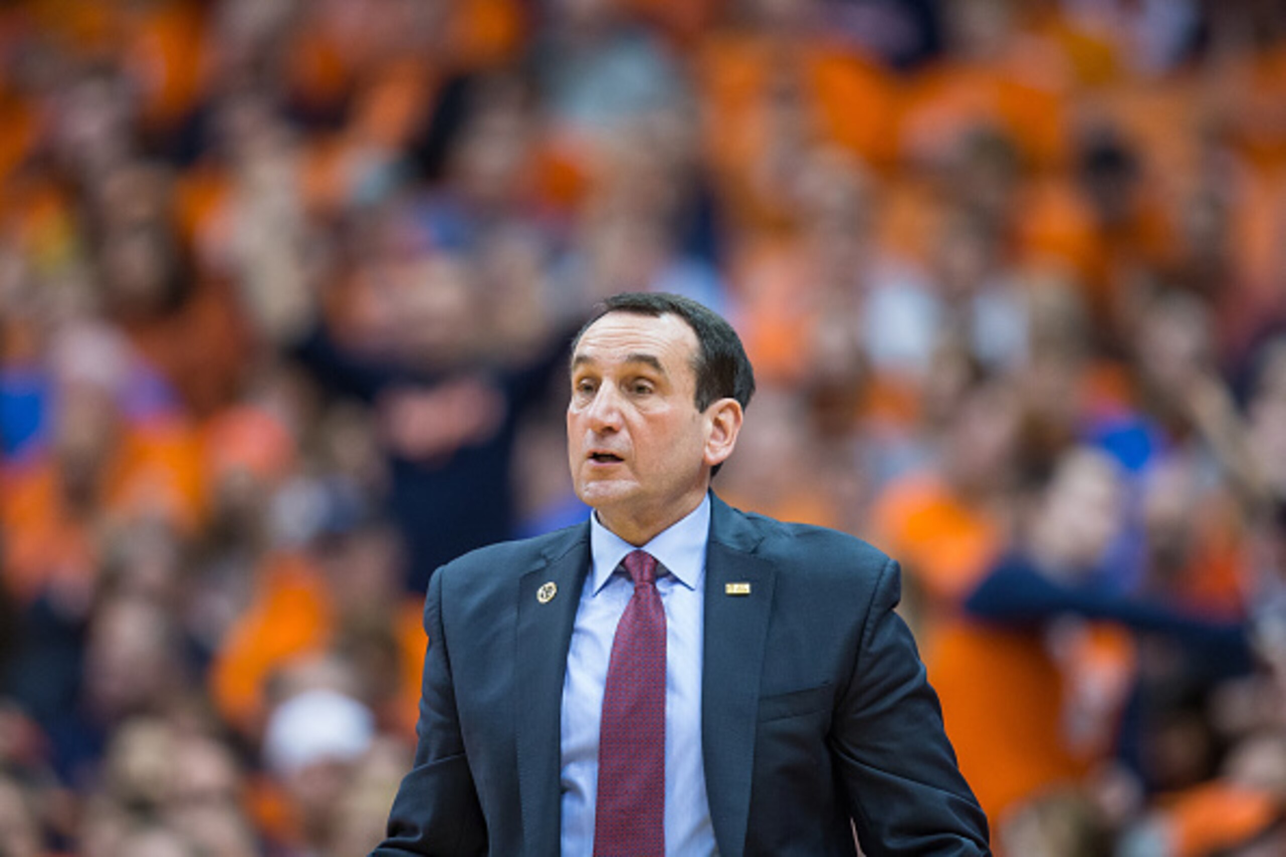 SYRACUSE, NY - FEBRUARY 14:  Head coach Mike Krzyzewski of the Duke Blue Devils watches game action between the Syracuse Orange and the Duke Blue Devils on February 14, 2015 at The Carrier Dome in Syracuse, New York.  Duke defeats Syracuse 80-72.  (Photo 