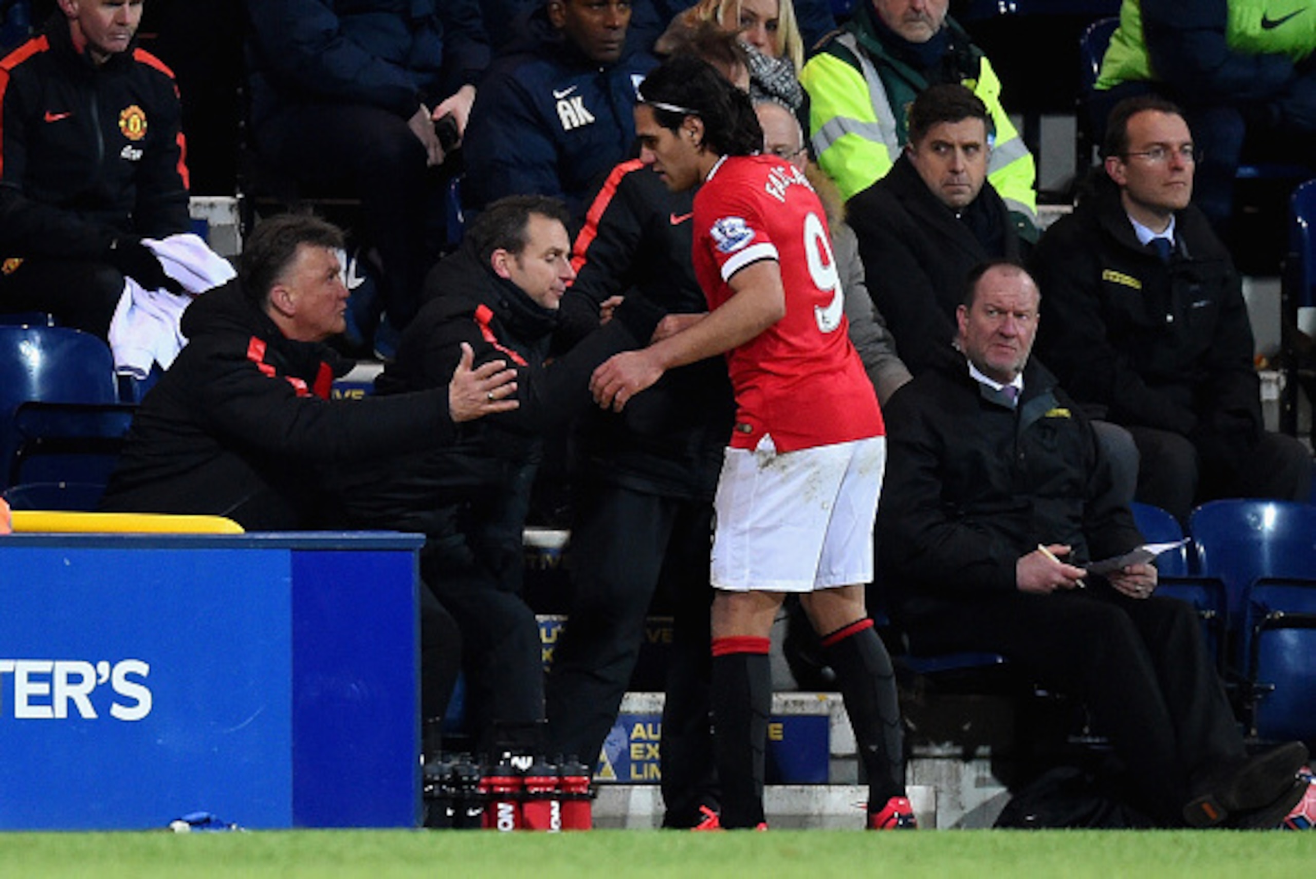 PRESTON, ENGLAND - FEBRUARY 16: Manager Louis van Gaal of Manchester United shakes hands with Radamel Falcao García of Manchester United as he is replaced during the FA Cup Fifth round match between Preston North End and Manchester United at Deepdale on F