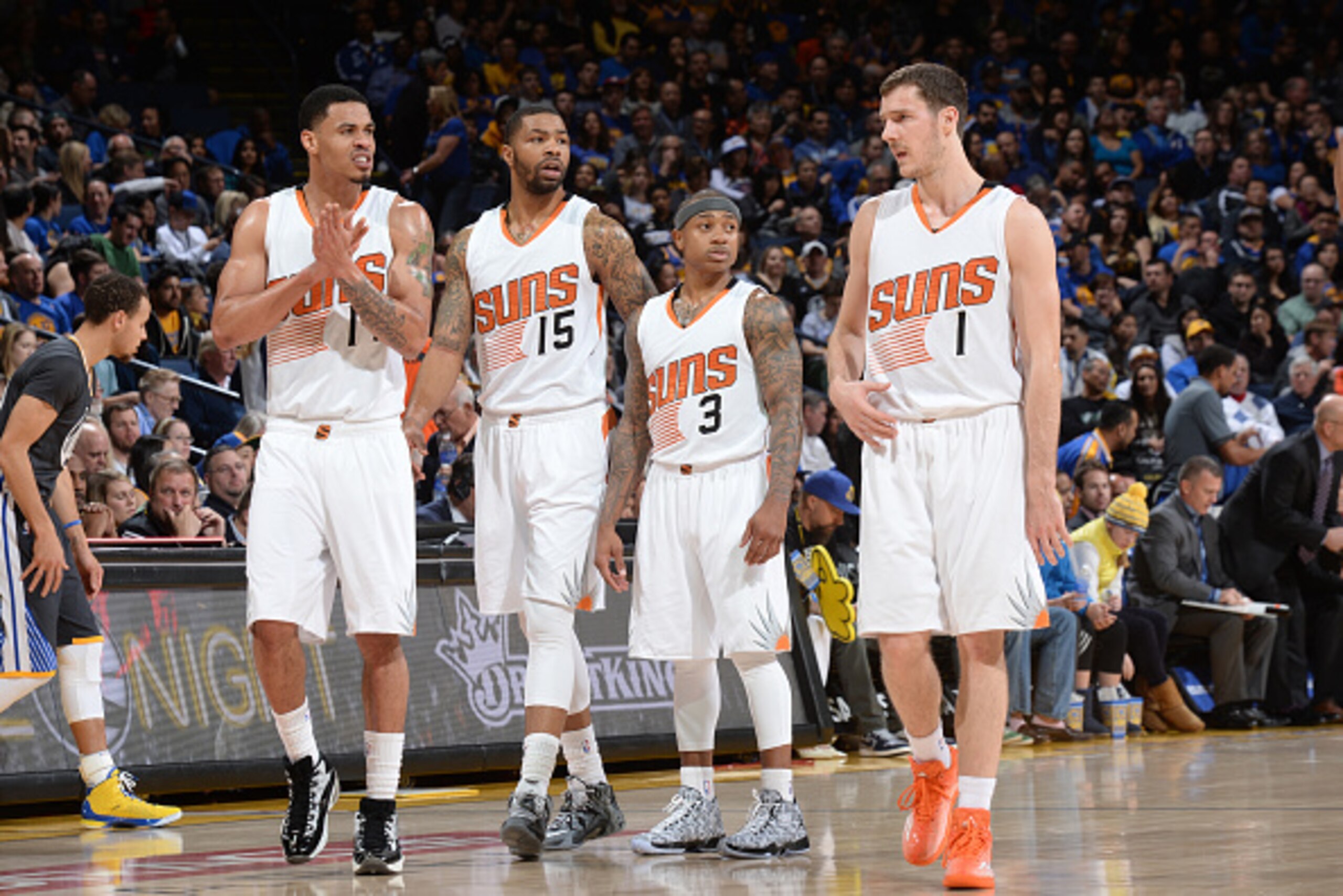 OAKLAND, CA - JANUARY 31: Gerald Green #14, Marcus Morris #15, Isaiah Thomas #3, and Goran Dragic #1 of the Phoenix Suns stand on the court during a game against the Golden State Warriors on January 31, 2015 at Oracle Arena in Oakland, California. NOTE TO