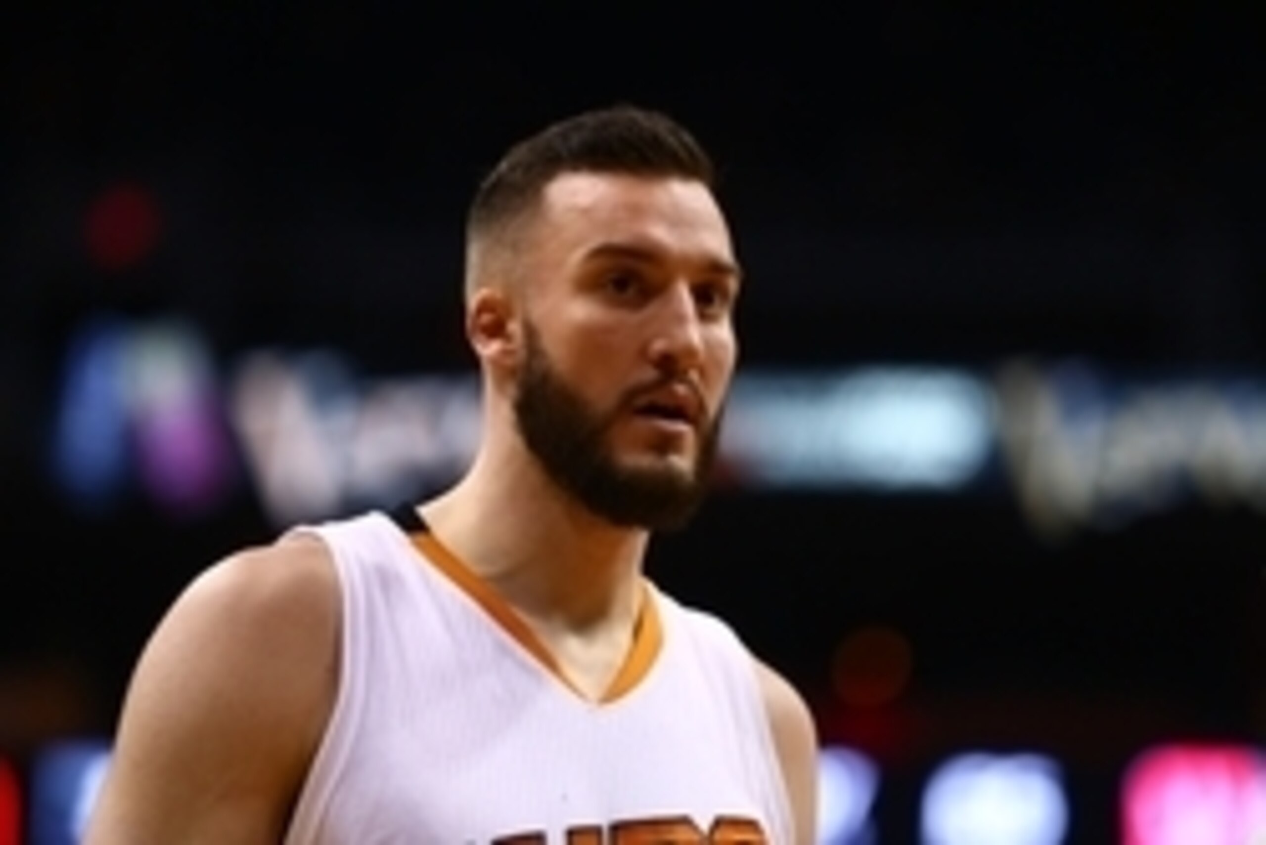 Jan 4, 2015; Phoenix, AZ, USA; Phoenix Suns center Miles Plumlee (22) against the Toronto Raptors at US Airways Center. The Suns defeated the Raptors 125-109. Mandatory Credit: Mark J. Rebilas-USA TODAY Sports