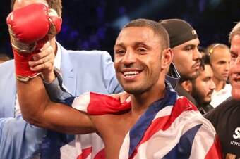 LOS ANGELES, CA - AUGUST 16:  Kell Brook poses with his belt and flag after getting the decision over Shawn Porter in their IBF Welterweight World Championship fight at StubHub Center on August 16, 2014 in Los Angeles, California.  (Photo by Stephen Dunn/