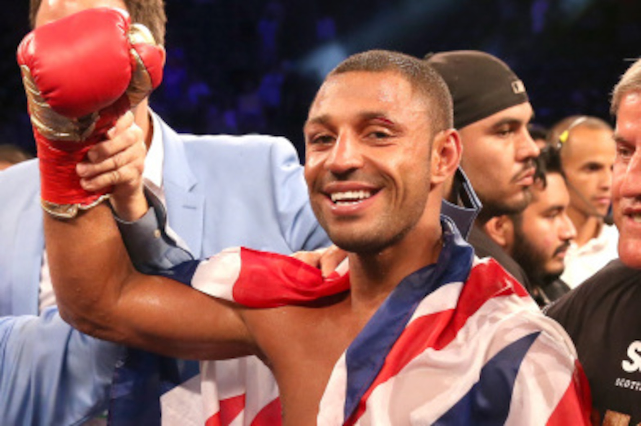 LOS ANGELES, CA - AUGUST 16:  Kell Brook poses with his belt and flag after getting the decision over Shawn Porter in their IBF Welterweight World Championship fight at StubHub Center on August 16, 2014 in Los Angeles, California.  (Photo by Stephen Dunn/