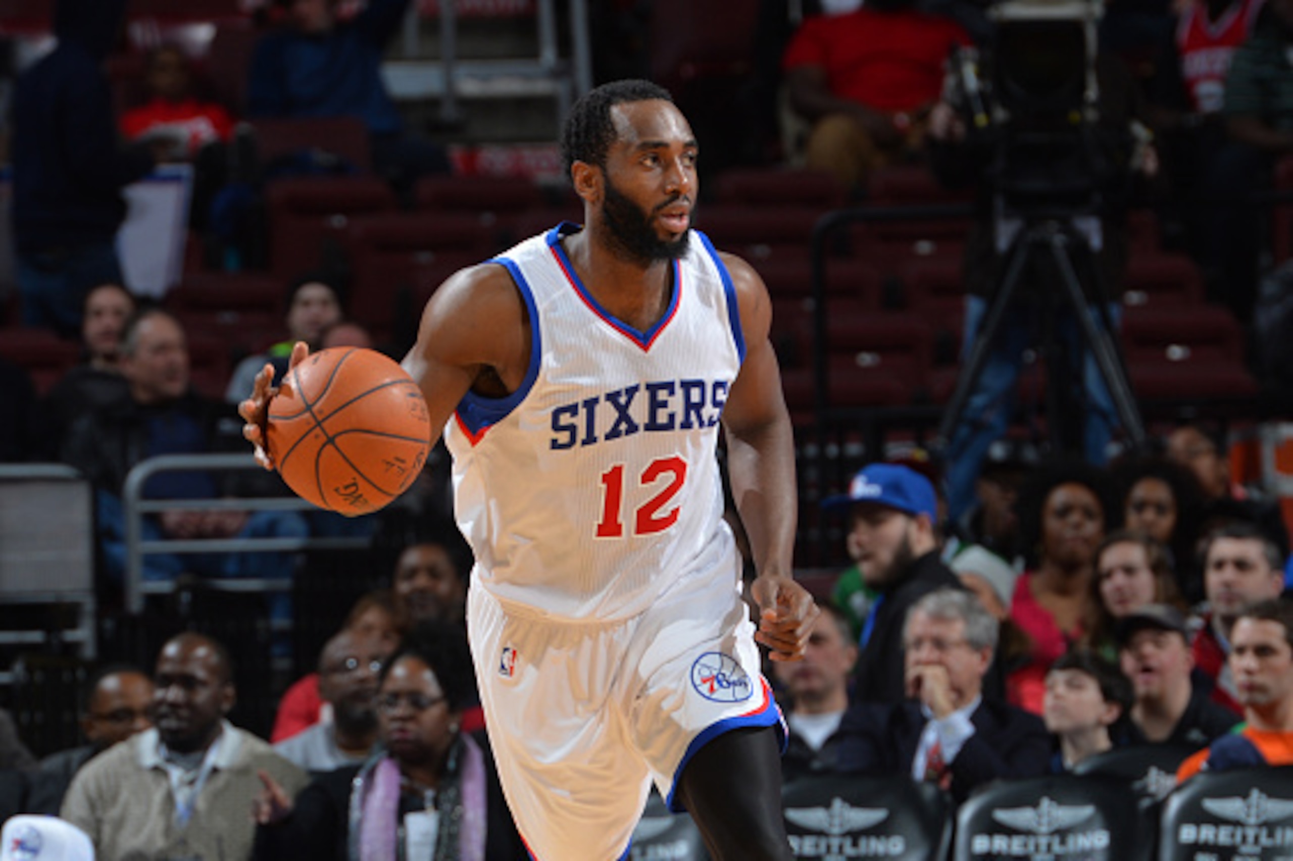 PHILADELPHIA, PA - JANUARY 28: Luc Richard Mbah a Moute #12 of the Philadelphia 76ers dribbles up the court against the Detroit Pistons at Wells Fargo Center on January 28, 2015 in Philadelphia, Pennsylvania NOTE TO USER: User expressly acknowledges and a