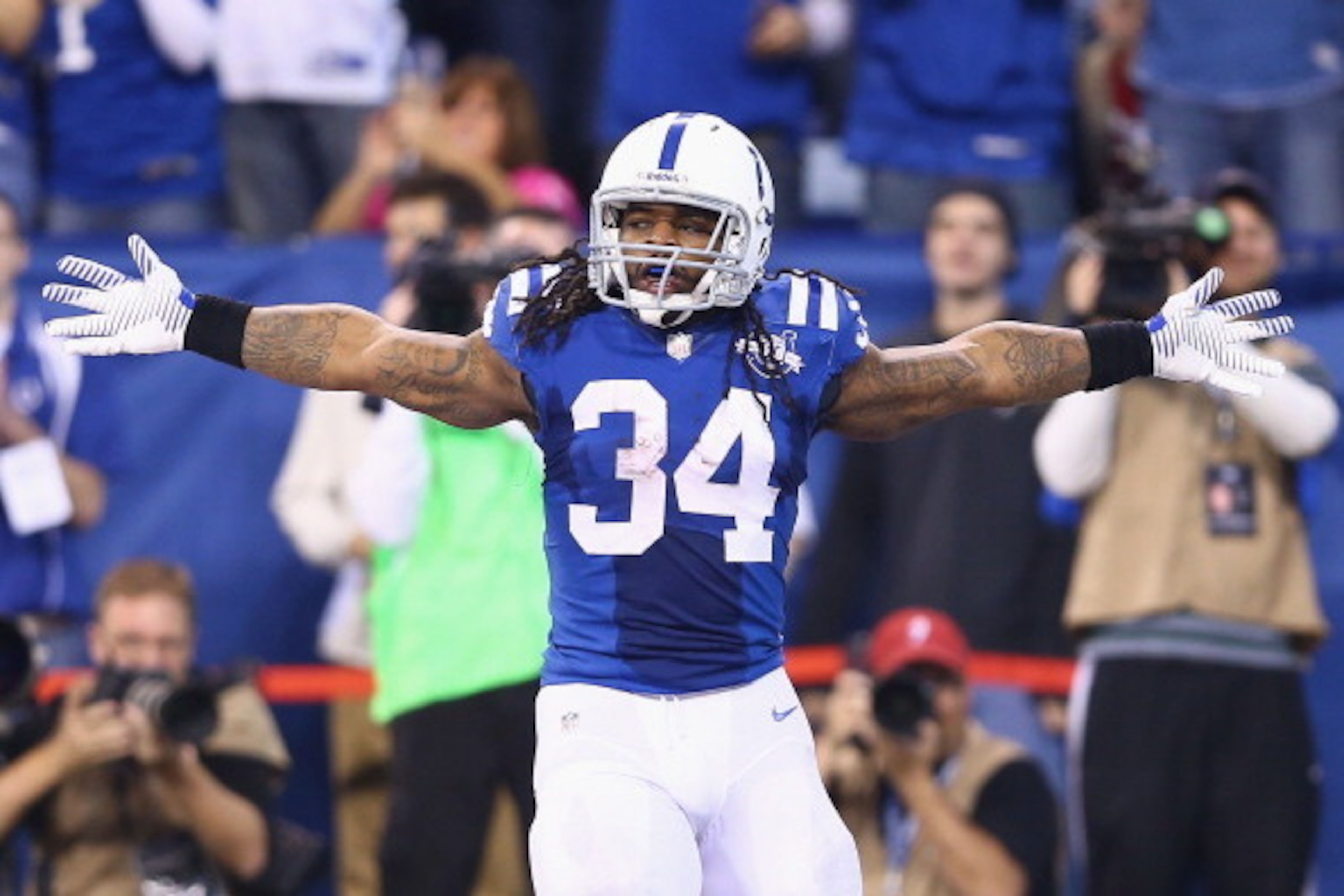 INDIANAPOLIS, IN - DECEMBER 15:  Trent Richardson #34 of the Indianapolis Colts celebrates after scoring a touchdown during the NFL game against the Houston Texans at Lucas Oil Stadium on December 15, 2013 in Indianapolis, Indiana.  (Photo by Andy Lyons/G