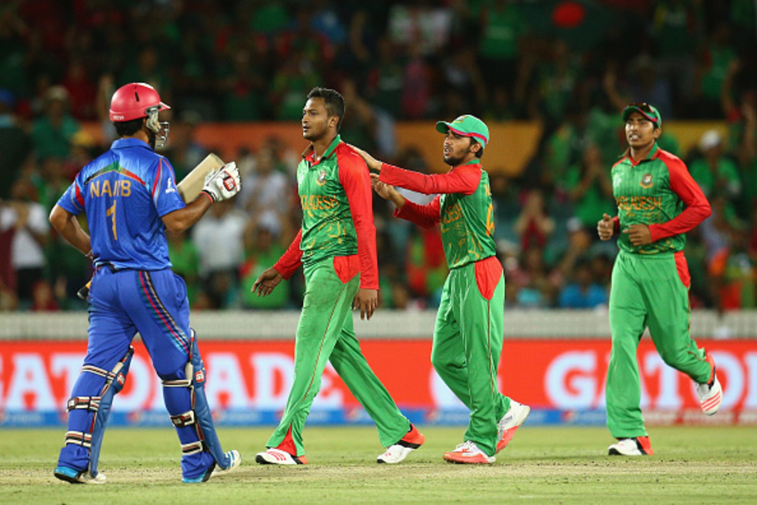 CANBERRA, AUSTRALIA - FEBRUARY 18:  Shakib Al Hasan of Bangladesh celebrates dismissing Najibullah Zadran of Afghanistan for lbw during the 2015 ICC Cricket World Cup match between Bangladesh and Afghanistan at Manuka Oval on February 18, 2015 in Canberra