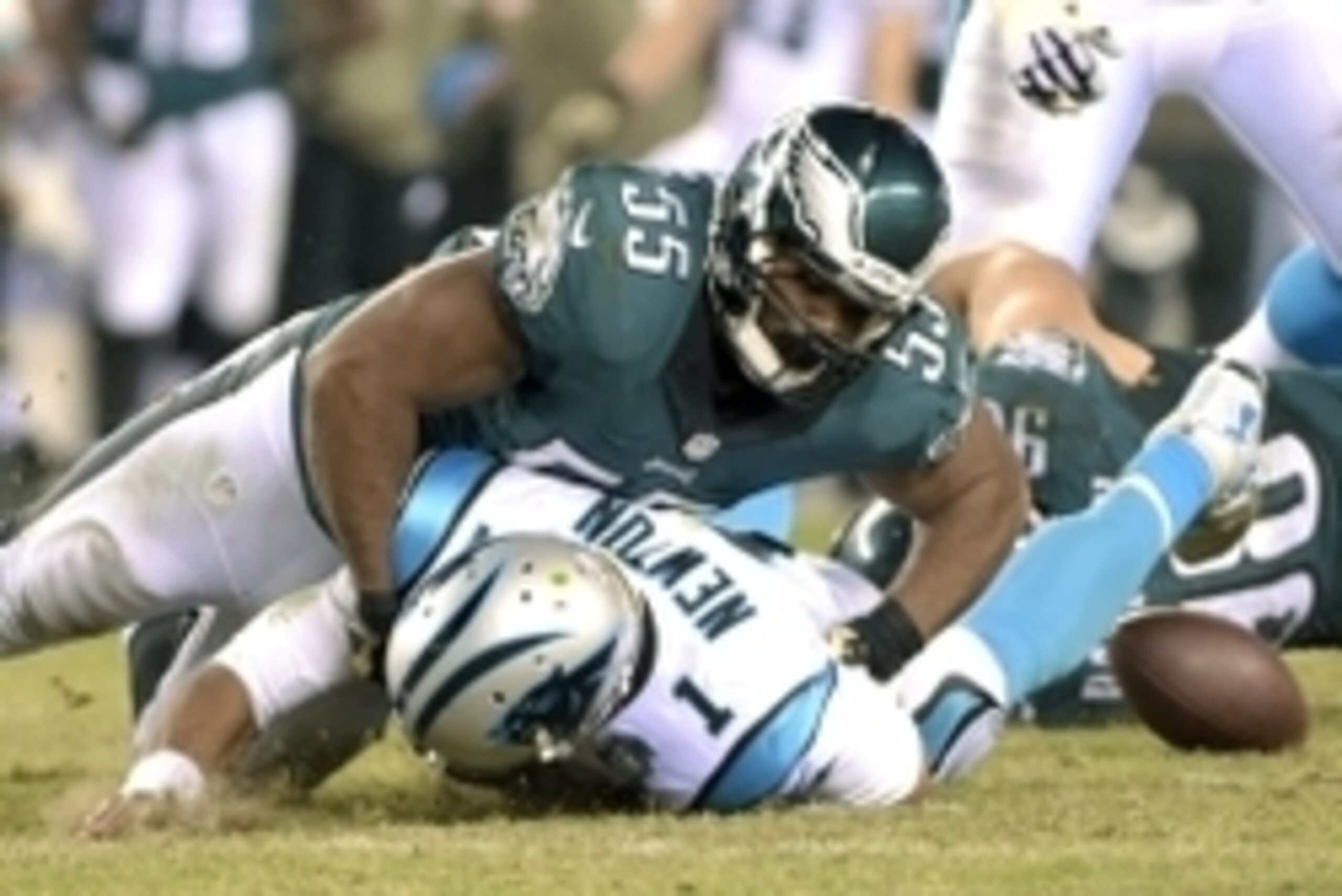 Nov 10, 2014; Philadelphia, PA, USA; Philadelphia Eagles linebacker Brandon Graham (55) knocks the ball loose from Carolina Panthers quarterback Cam Newton (1) during the third quarter at Lincoln Financial Field. Mandatory Credit: Eric Hartline-USA TODAY 