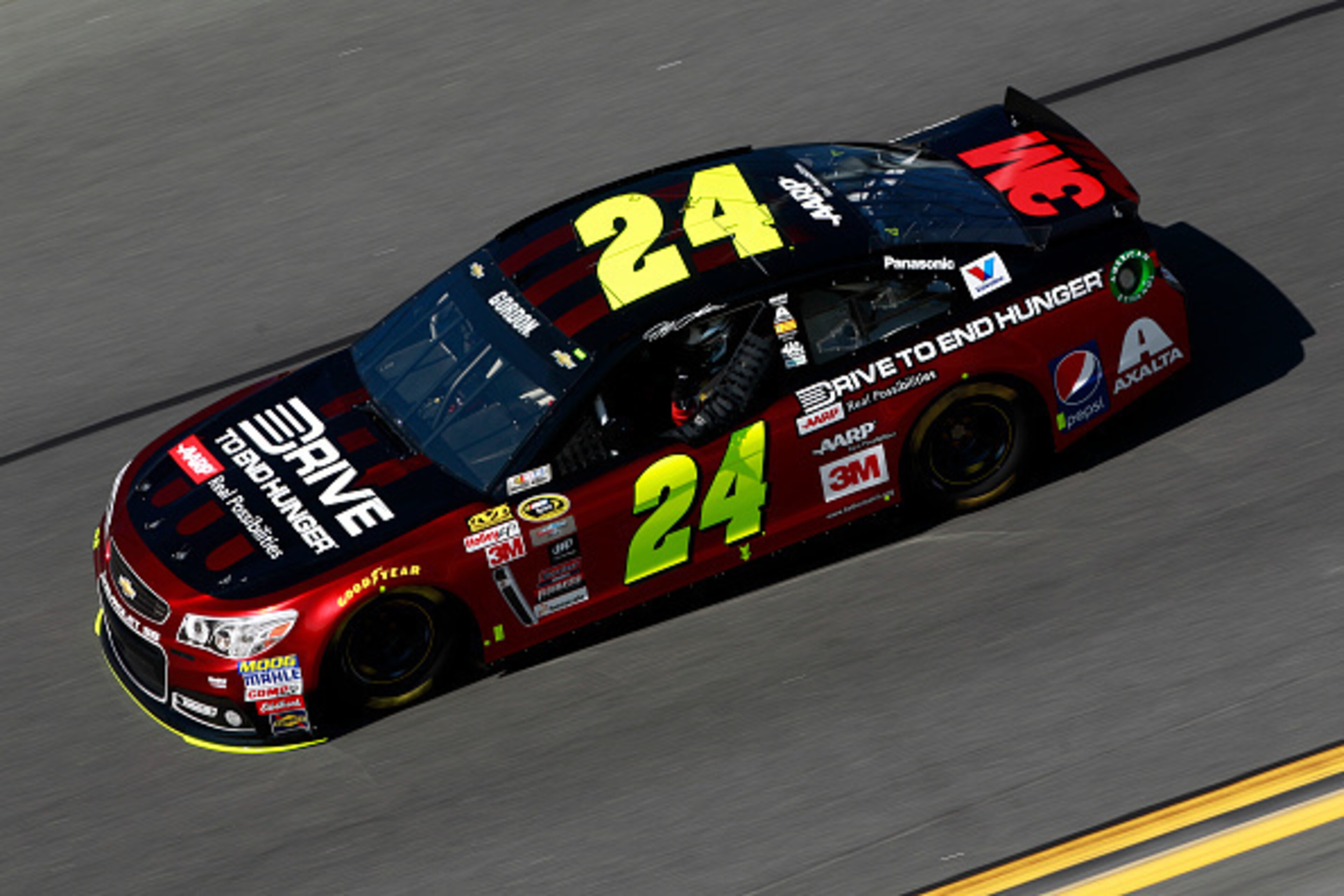 DAYTONA BEACH, FL - FEBRUARY 15: Jeff Gordon, driver of the #24 Drive To End Hunger Chevrolet, races during qualifying for the 57th Annual Daytona 500 at Daytona International Speedway on February 15, 2015 in Daytona Beach, Florida.  (Photo by Brian Lawde