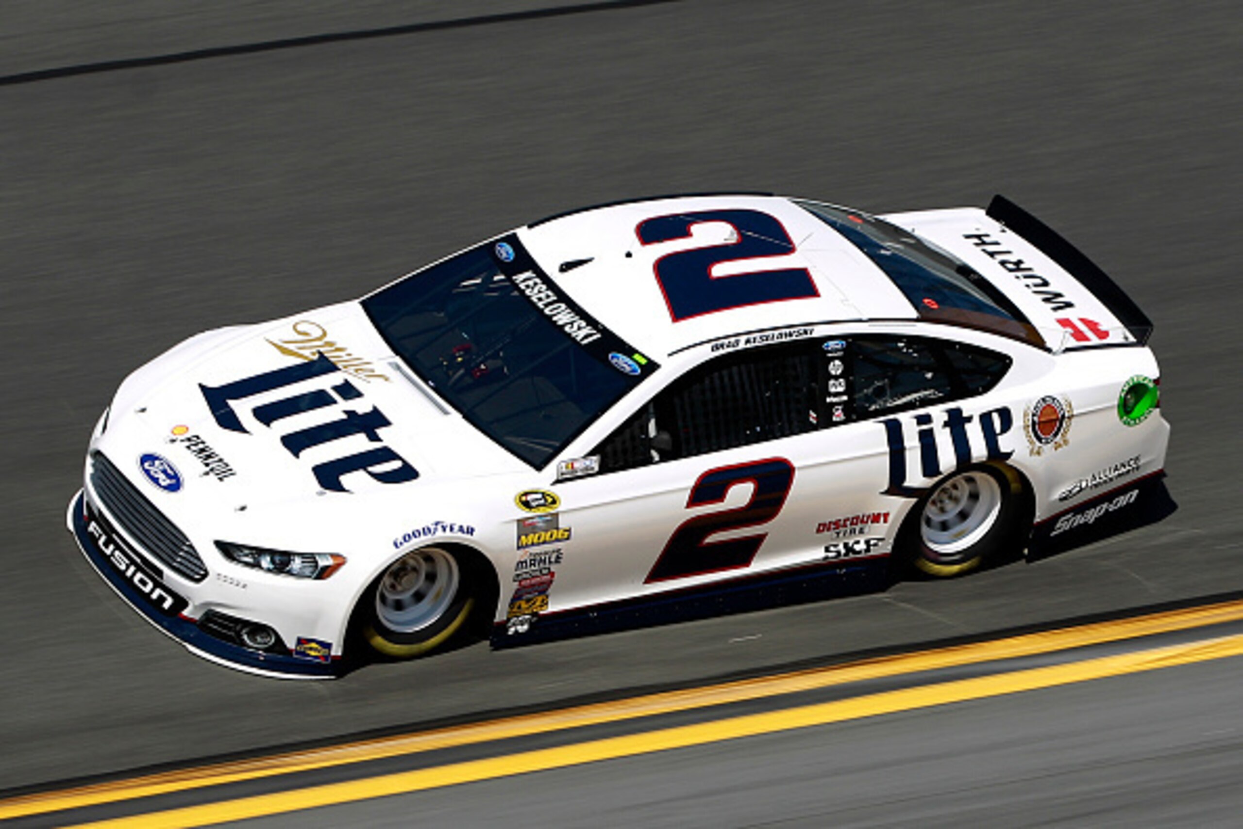 DAYTONA BEACH, FL - FEBRUARY 15: Brad Keselowski, driver of the #2 Miller Lite Ford, races during qualifying for the 57th Annual Daytona 500 at Daytona International Speedway on February 15, 2015 in Daytona Beach, Florida.  (Photo by Brian Lawdermilk/Gett