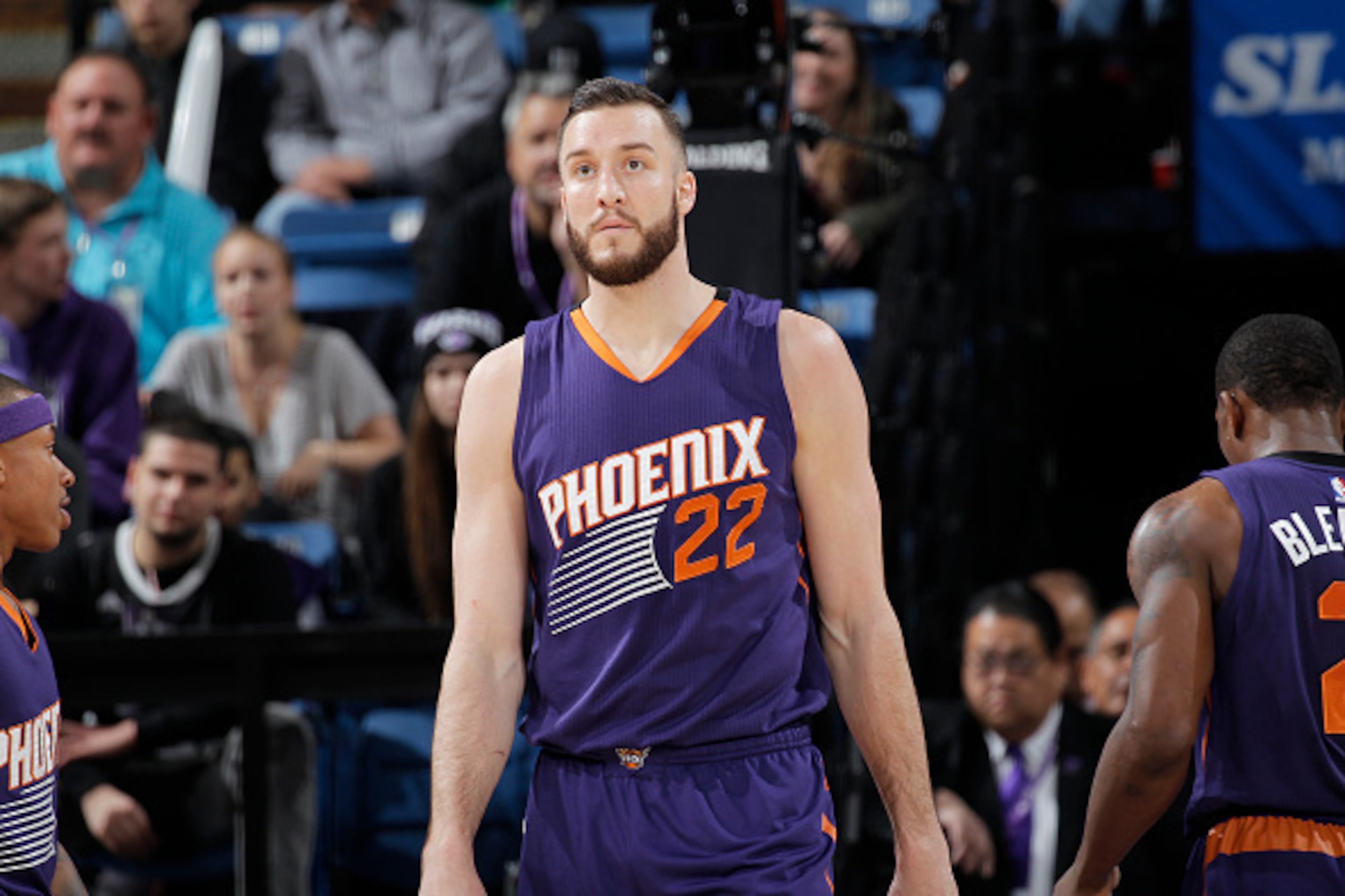 SACRAMENTO, CA - DECEMBER 26: Miles Plumlee #22 of the Phoenix Suns looks on during the game against the Sacramento Kings on December 26, 2014 at Sleep Train Arena in Sacramento, California. NOTE TO USER: User expressly acknowledges and agrees that, by do