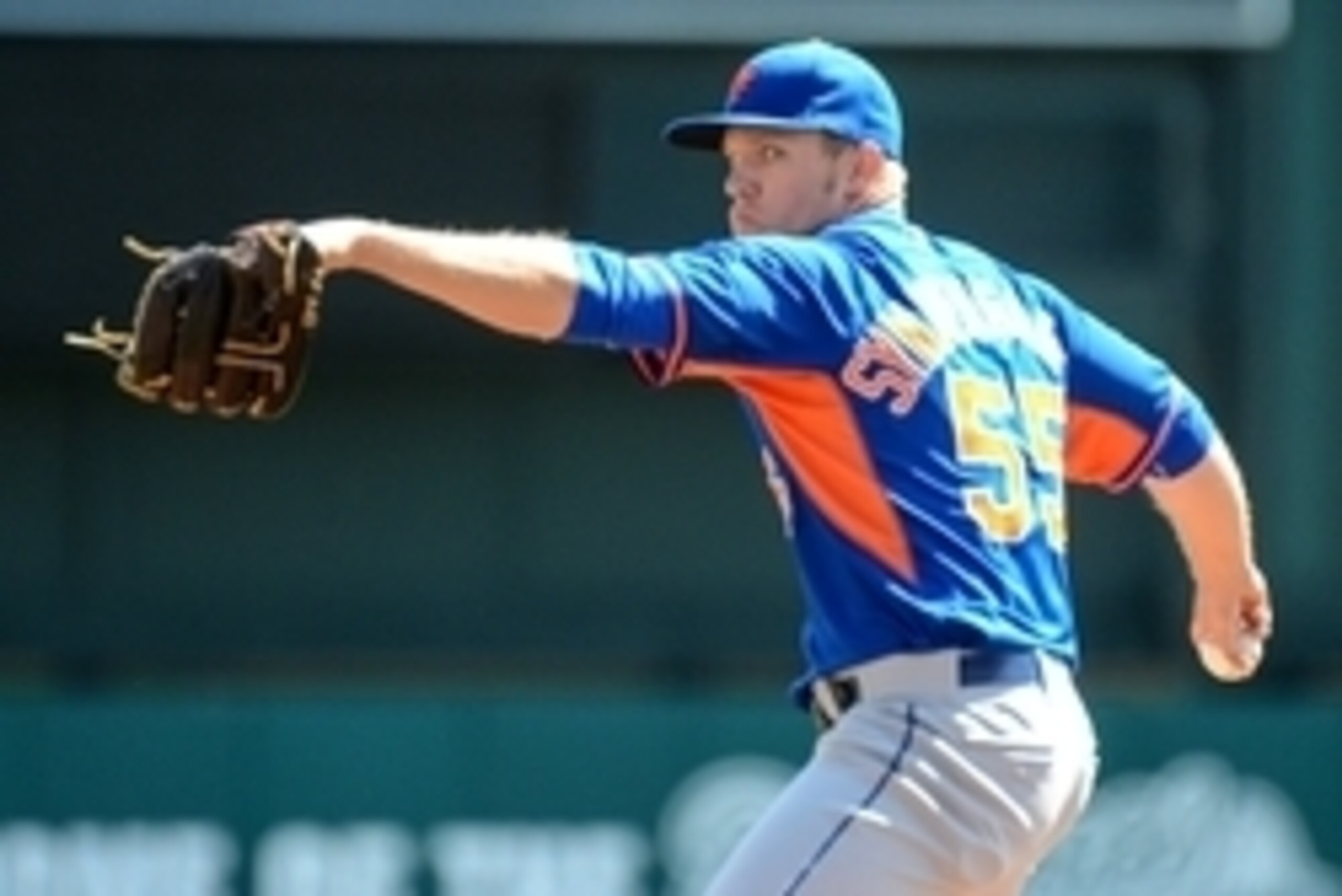 Mar 3, 2014; Lake Buena Vista, FL, USA; New Yorks Mets pitcher  Noah Syndergaard (55) warms up before the spring training exhibition game against the Atlanta Bravesat Champion Stadium. Mandatory Credit: Jonathan Dyer-USA TODAY Sports