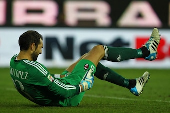 PARMA, ITALY - SEPTEMBER 14:  Diego Lopez of AC Milan lies injured during the Serie A match between Parma FC and AC Milan at Stadio Ennio Tardini on September 14, 2014 in Parma, Italy.  (Photo by Marco Luzzani/Getty Images)