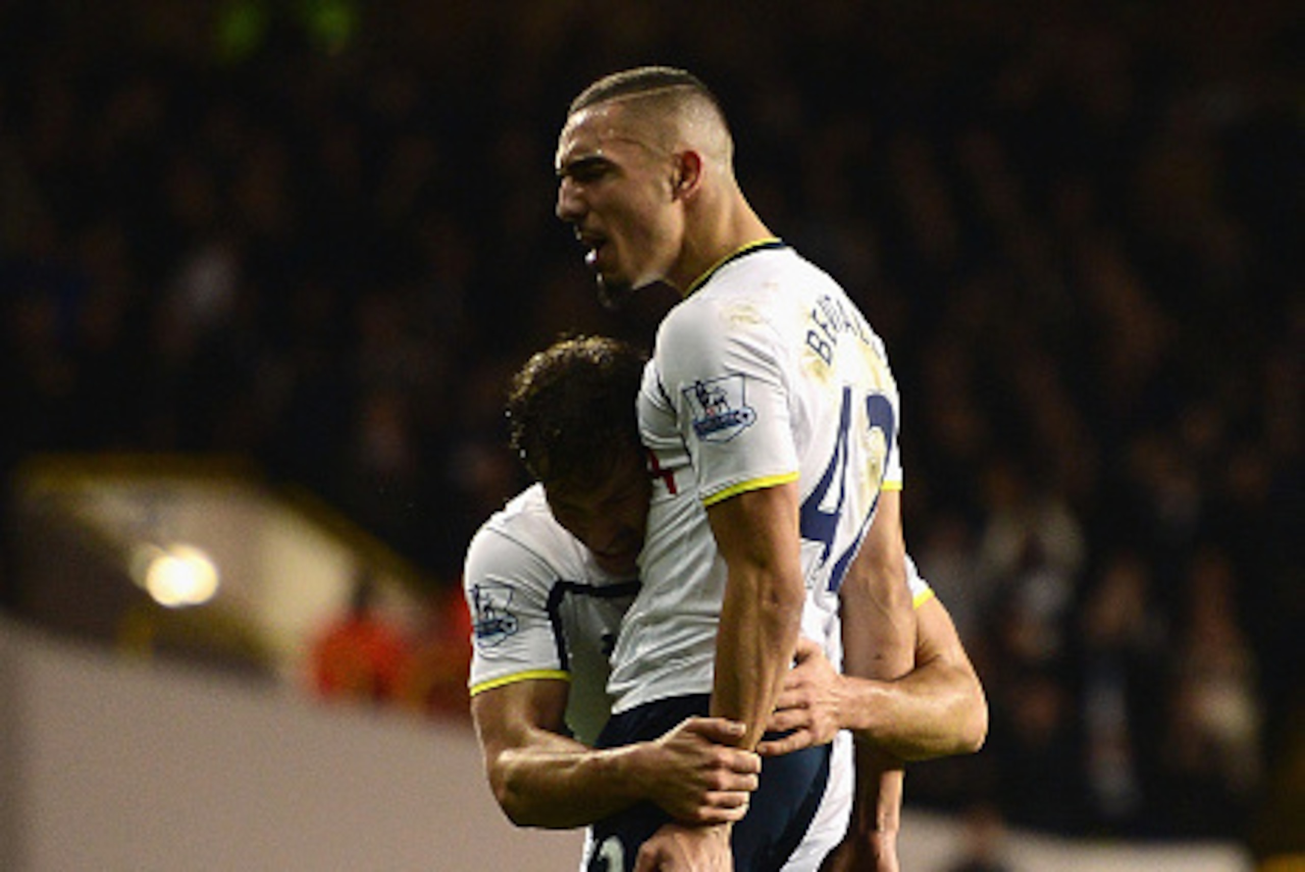 LONDON, ENGLAND - DECEMBER 17:  Nabil Bentaleb of Tottenham Hotspur celebrates scoring the opening goal with Benjamin Stambouli of Tottenham Hotspur during the Capital One Cup Quarter-Final match between Tottenham Hotspur and Newcastle United at White Har