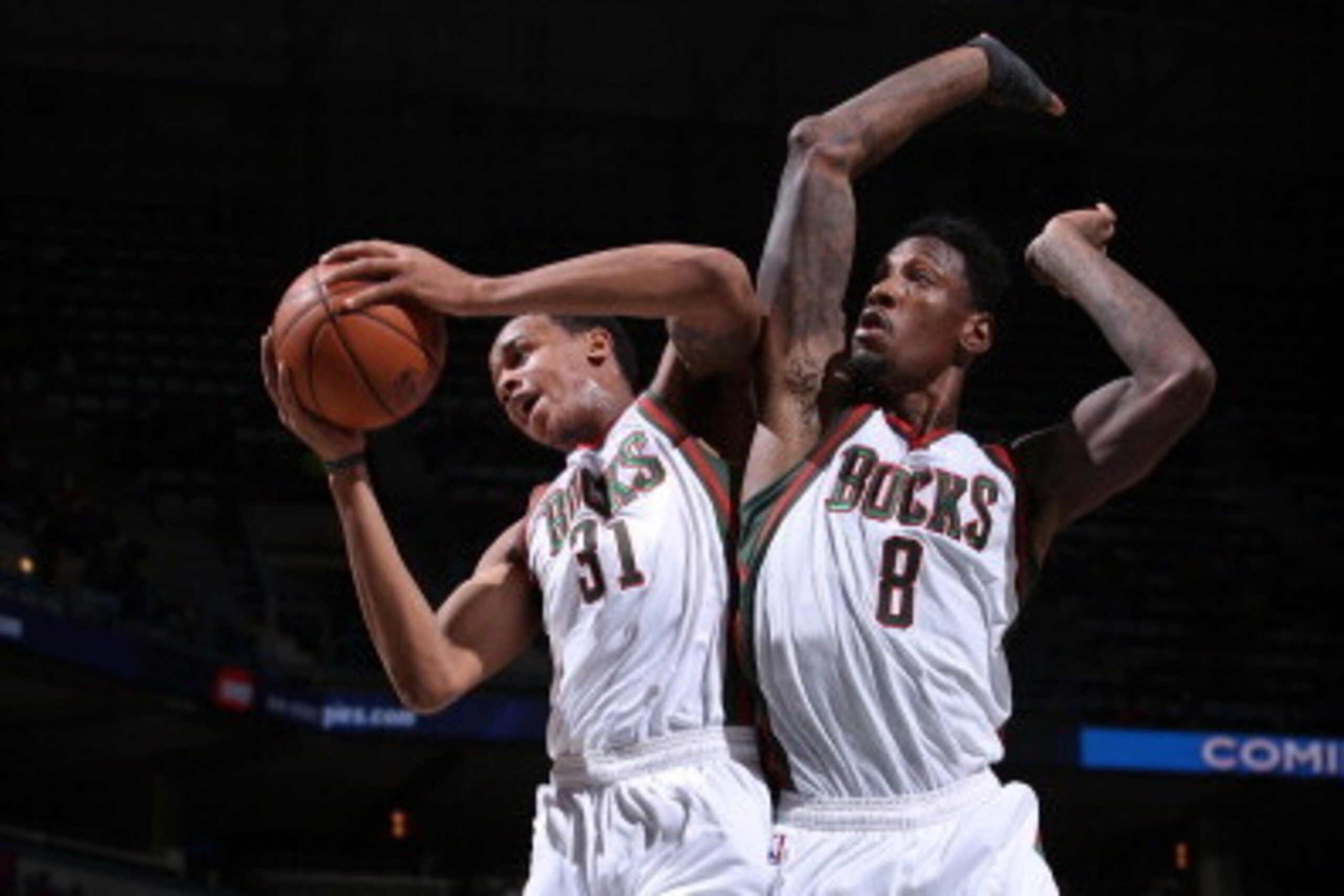 MILWAUKEE, WI - January 15: (L-R) John Henson #31 and Larry Sanders #8 of the Milwaukee Bucks jump for a rebound against the Memphis Grizzlies on January 1, 2014 at the BMO Harris Bradley Center in Milwaukee, Wisconsin. NOTE TO USER:  User expressly ackno