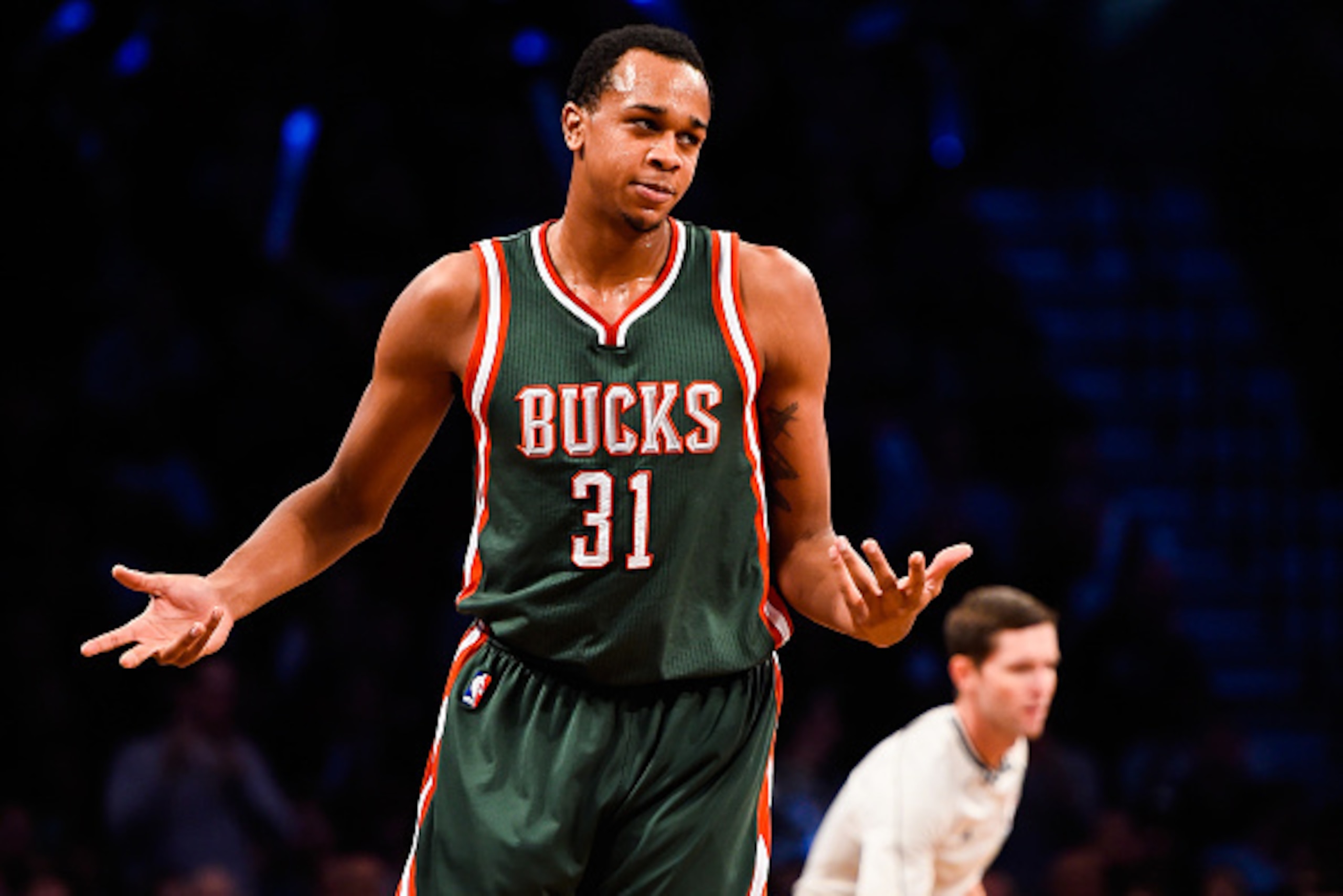 NEW YORK, NY - NOVEMBER 19: John Henson #31 of the Milwaukee Bucks reacts after a turnover in the fourth quarter during a game against the Brooklyn Nets at the Barclays Center on November 19, 2014 in the Brooklyn borough of New York City. NOTE TO USER: Us