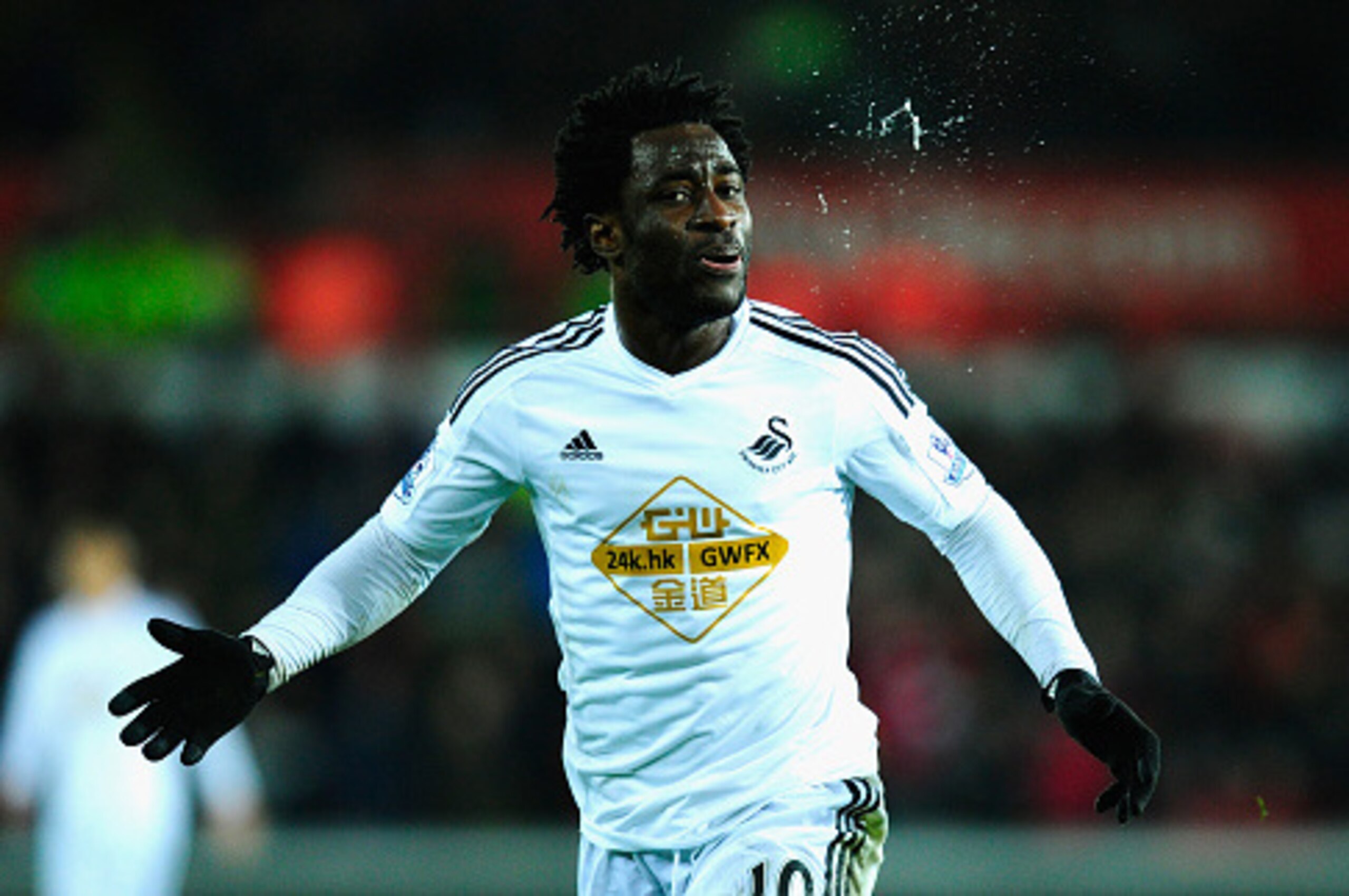 SWANSEA, WALES - DECEMBER 26:  Wilfried Bony of Swansea reacts after having a goal disallowed during the Barclays Premier League match between Swansea City and Aston Villa at Liberty Stadium on December 26, 2014 in Swansea, Wales.  (Photo by Stu Forster/G
