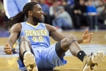 Feb 3, 2015; Philadelphia, PA, USA; Denver Nuggets forward Kenneth Faried (35) reacts to a foul during the second quarter of a game against the Philadelphia 76ers at Wells Fargo Center. Mandatory Credit: Bill Streicher-USA TODAY Sports
