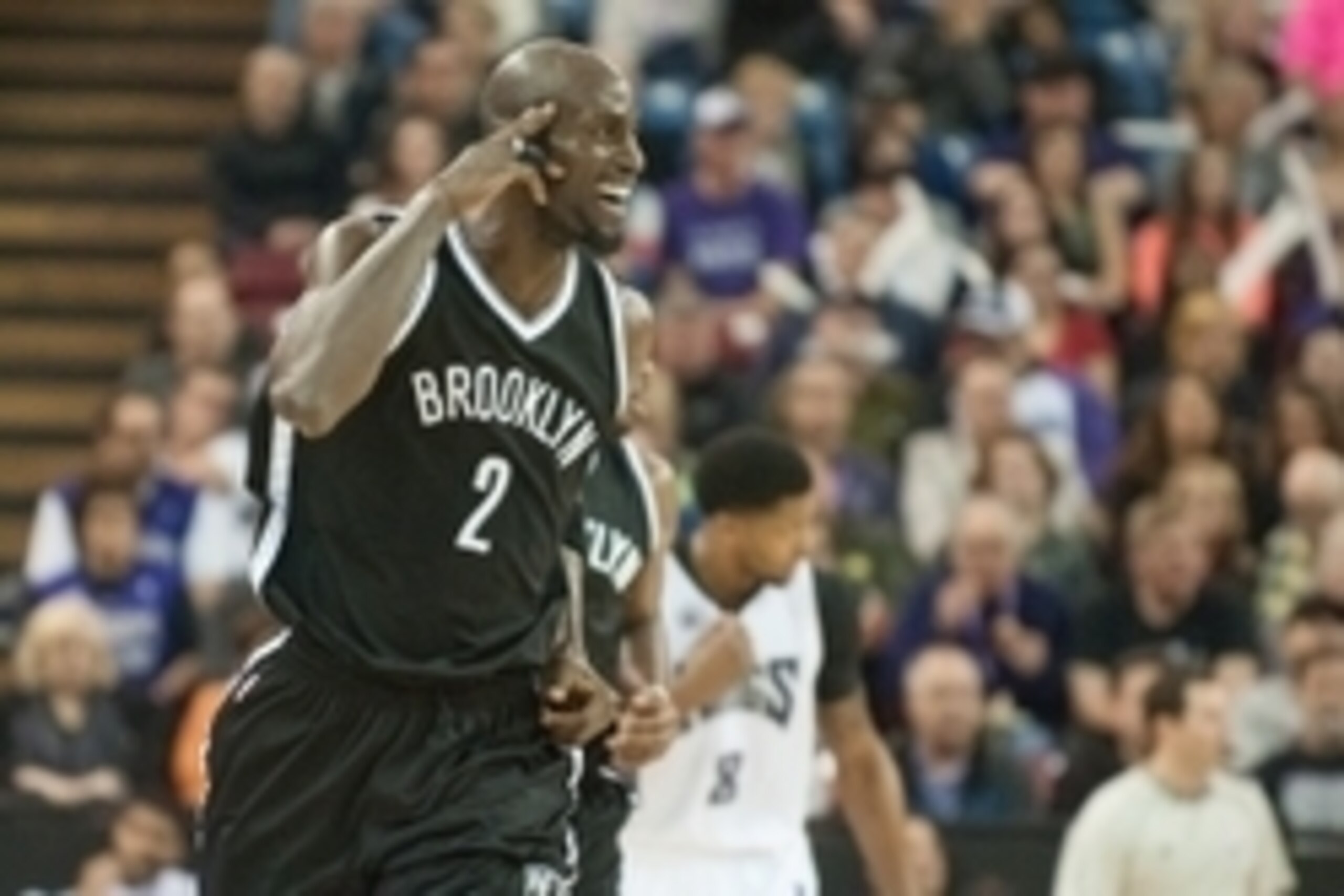 Jan 21, 2015; Sacramento, CA, USA; Brooklyn Nets forward Kevin Garnett (2) reacts after missing a basket against the Sacramento Kings during the third quarter at Sleep Train Arena. The Nets won 103-100. Mandatory Credit: Ed Szczepanski-USA TODAY Sports