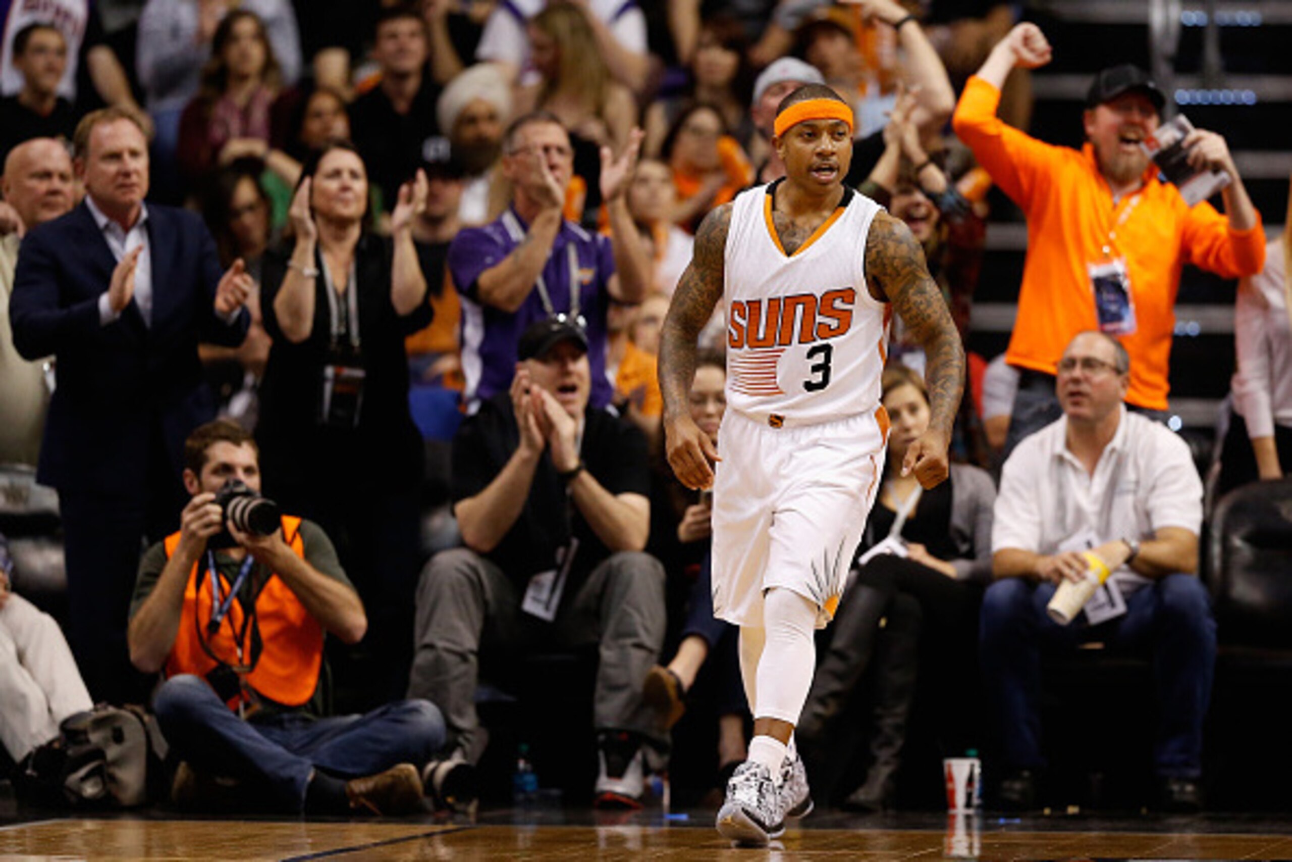 PHOENIX, AZ - FEBRUARY 10:  Isaiah Thomas #3 of the Phoenix Suns reacts after scoring and drawing a foul against the Houston Rockets during the first half of the NBA game at US Airways Center on February 10, 2015 in Phoenix, Arizona. NOTE TO USER: User ex