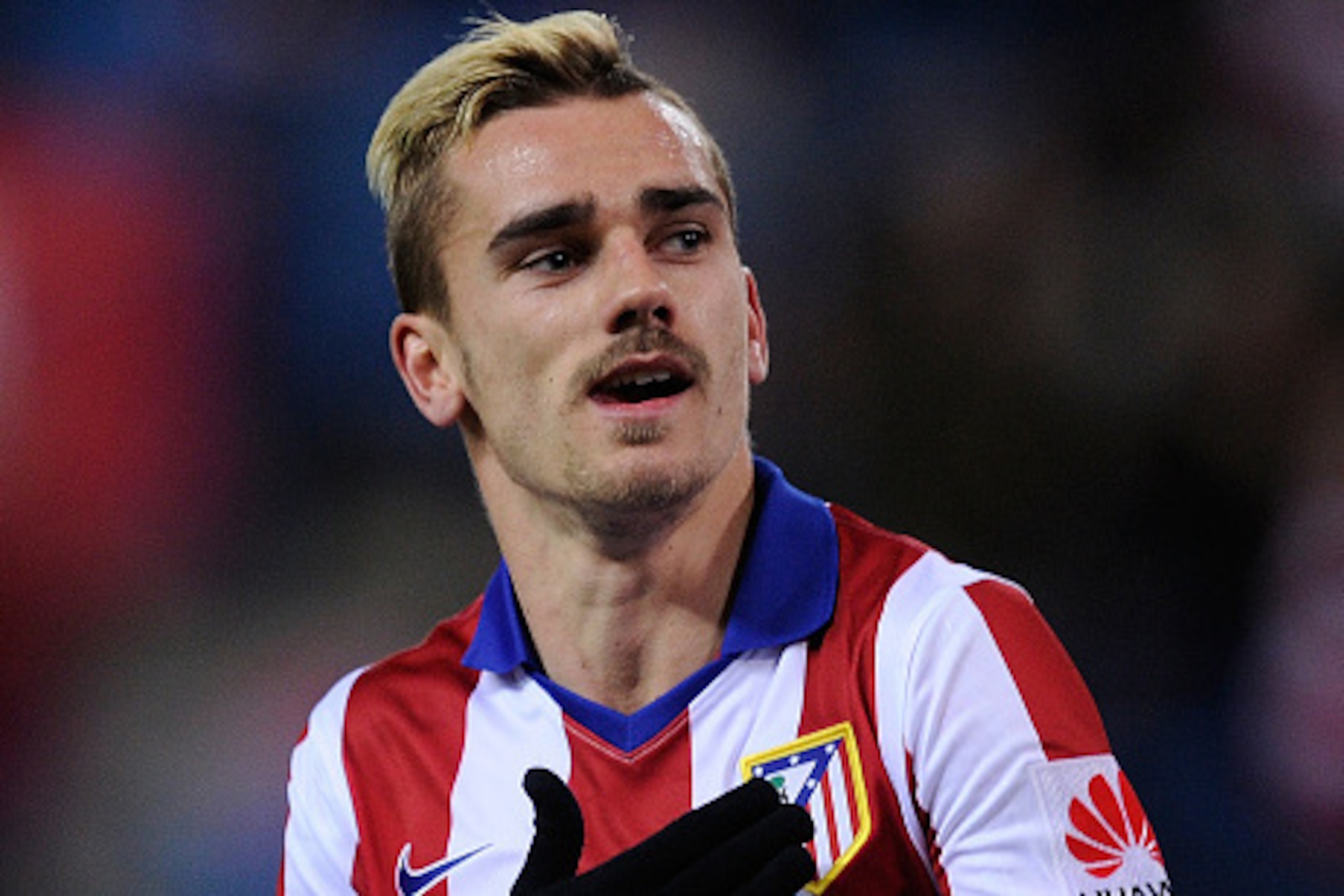 MADRID, SPAIN - JANUARY 24: Antoine Griezmann of Club Atletico de Madrid celebrates after scoring his team's 2nd goal during the La Liga match between Club Atletico de Madrid and Rayo Vallecano de Madrid at Vicente Calderon Stadium on January 24, 2015 MADRID, SPAIN - JANUARY 24: Antoine Griezmann of Club Atletico de Madrid celebrates after scoring his team's 2nd goal during the La Liga match between Club Atletico de Madrid and Rayo Vallecano de Madrid at Vicente Calderon Stadium on January 24, 2015