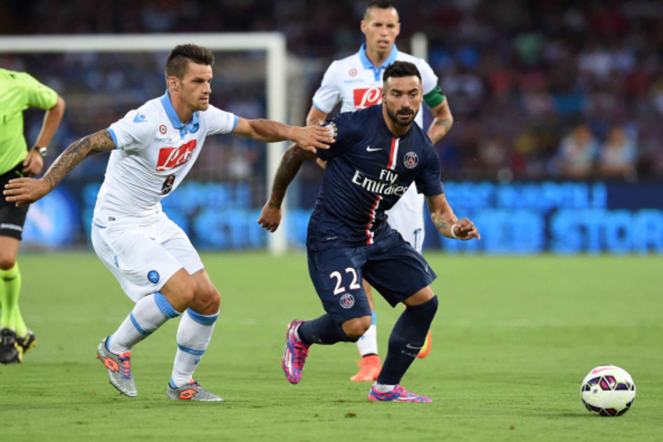 NAPLES, ITALY - AUGUST 11: Christian Maggio of Napoli and Ezequiel Lavezzi of Paris Saint Germain in action during the pre-season friendly match between SSC Napoli and Paris Saint-Germain FC at Stadio San Paolo on August 11, 2014 in Naples, Italy. (Pho NAPLES, ITALY - AUGUST 11: Christian Maggio of Napoli and Ezequiel Lavezzi of Paris Saint Germain in action during the pre-season friendly match between SSC Napoli and Paris Saint-Germain FC at Stadio San Paolo on August 11, 2014 in Naples, Italy. (Pho