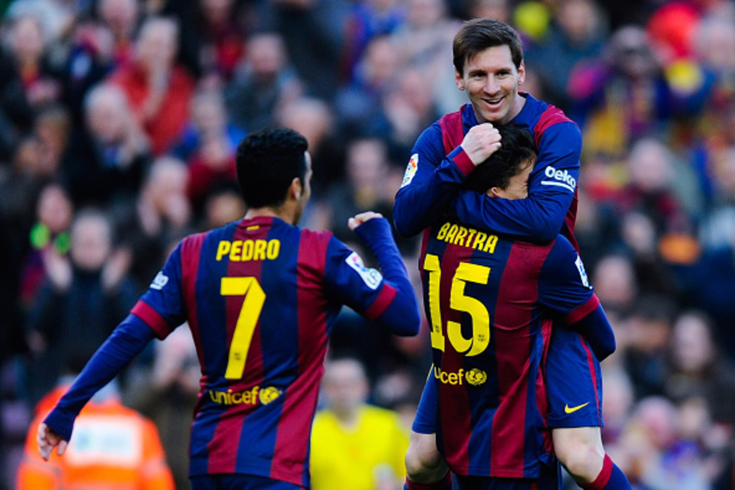 BARCELONA, SPAIN - FEBRUARY 15:  Lionel Messi of FC Barcelona celebrates with his teammates after scoring his team's second goal during the La Liga match between FC Barcelona and Levante UD at Camp Nou on February 15, 2015 in Barcelona, Spain.  (Photo by 