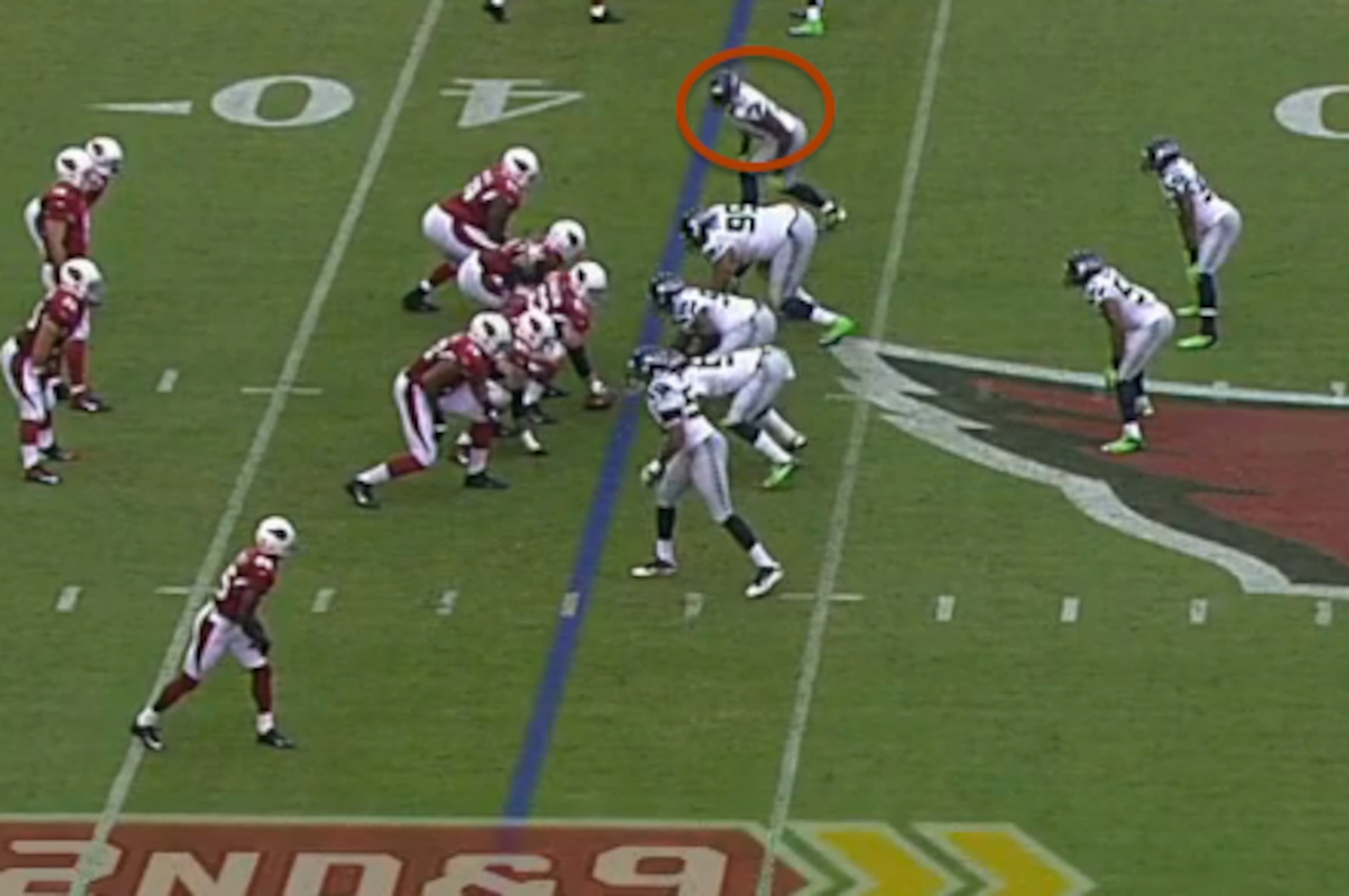 Clemons lifts his hand off the ground to turn the front into a 3-4.