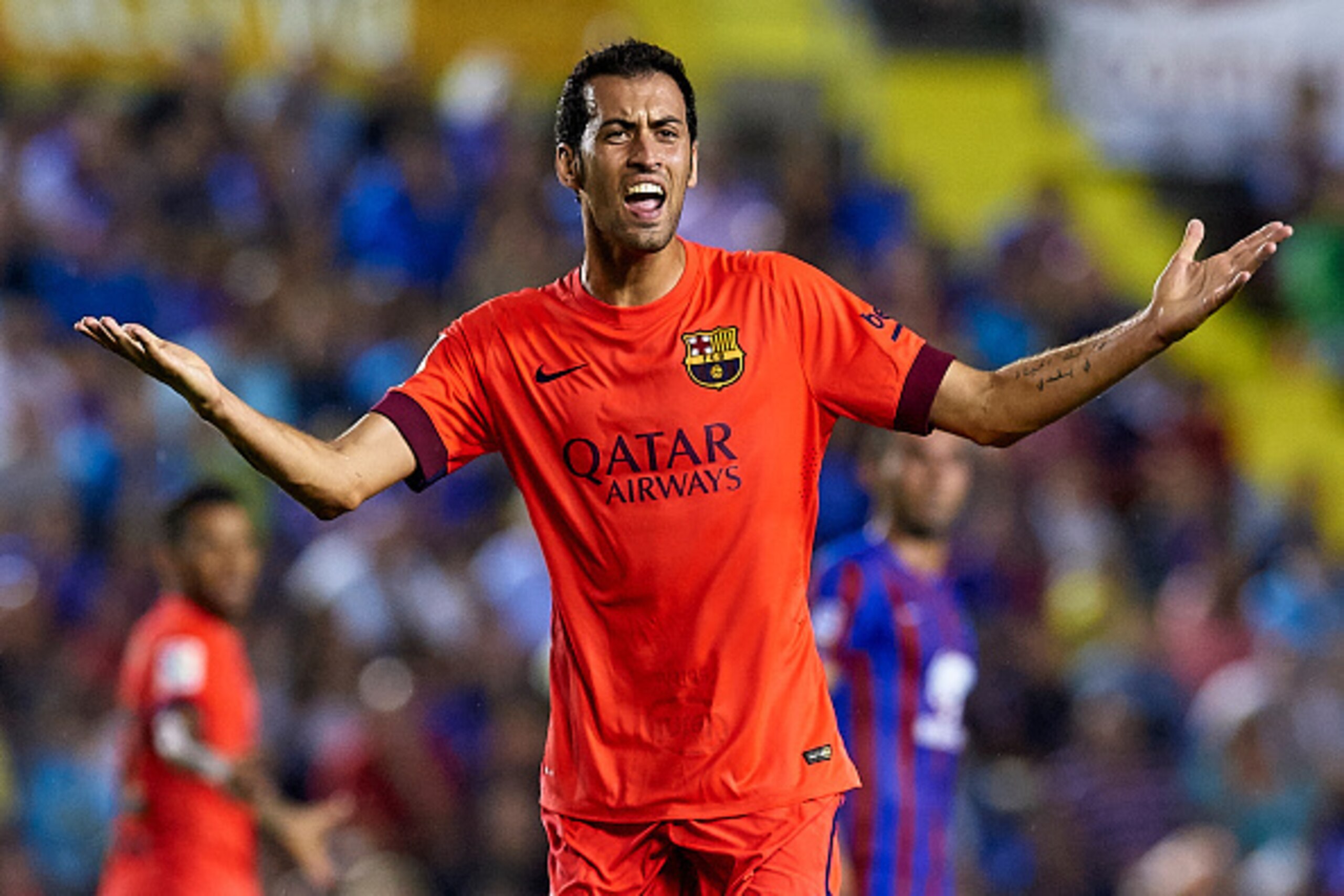 VALENCIA, SPAIN - SEPTEMBER 21:  Sergio Busquets of Barcelona reacts during the La Liga match between Levante UD and FC Barcelona at Ciutat de Valencia on September 21, 2014 in Valencia, Spain.  (Photo by Manuel Queimadelos Alonso/Getty Images)
