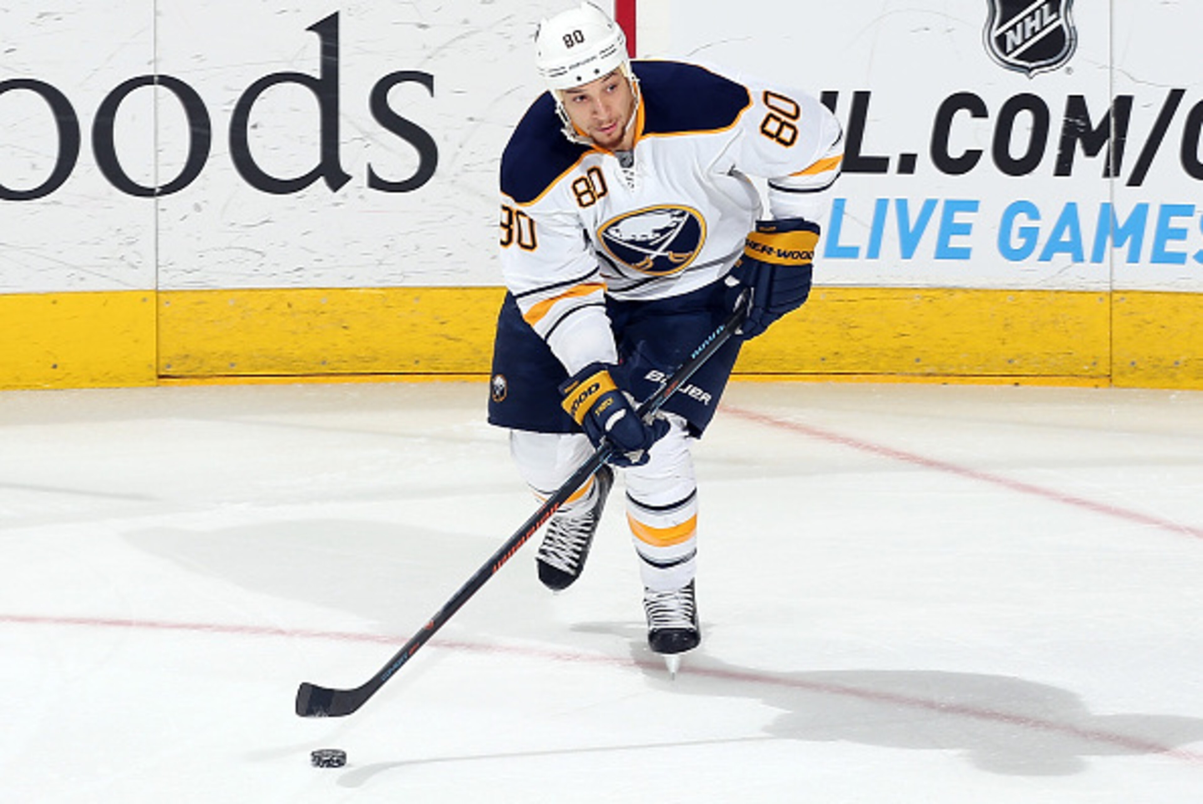 RALEIGH, NC - JANUARY 08: Chris Stewart #80 of the Buffalo Sabres looks to pass the puck during their NHL game against the Carolina Hurricanes at PNC Arena on January 8, 2015 in Raleigh, North Carolina.  (Photo by Gregg Forwerck/NHLI via Getty Images)