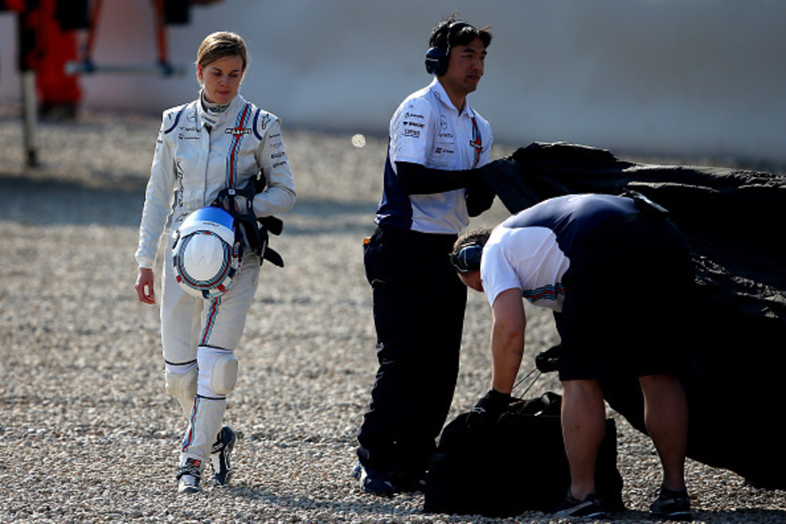 MONTMELO, SPAIN - FEBRUARY 19: Susie Wolff of Williams and Great Britain walks away from her car after a collision with Felipe Nasr of Brazil and Sauber F1 during day one of Formula One Winter Testing at Circuit de Catalunya on February 19, 2015 in Montm MONTMELO, SPAIN - FEBRUARY 19: Susie Wolff of Williams and Great Britain walks away from her car after a collision with Felipe Nasr of Brazil and Sauber F1 during day one of Formula One Winter Testing at Circuit de Catalunya on February 19, 2015 in Montm