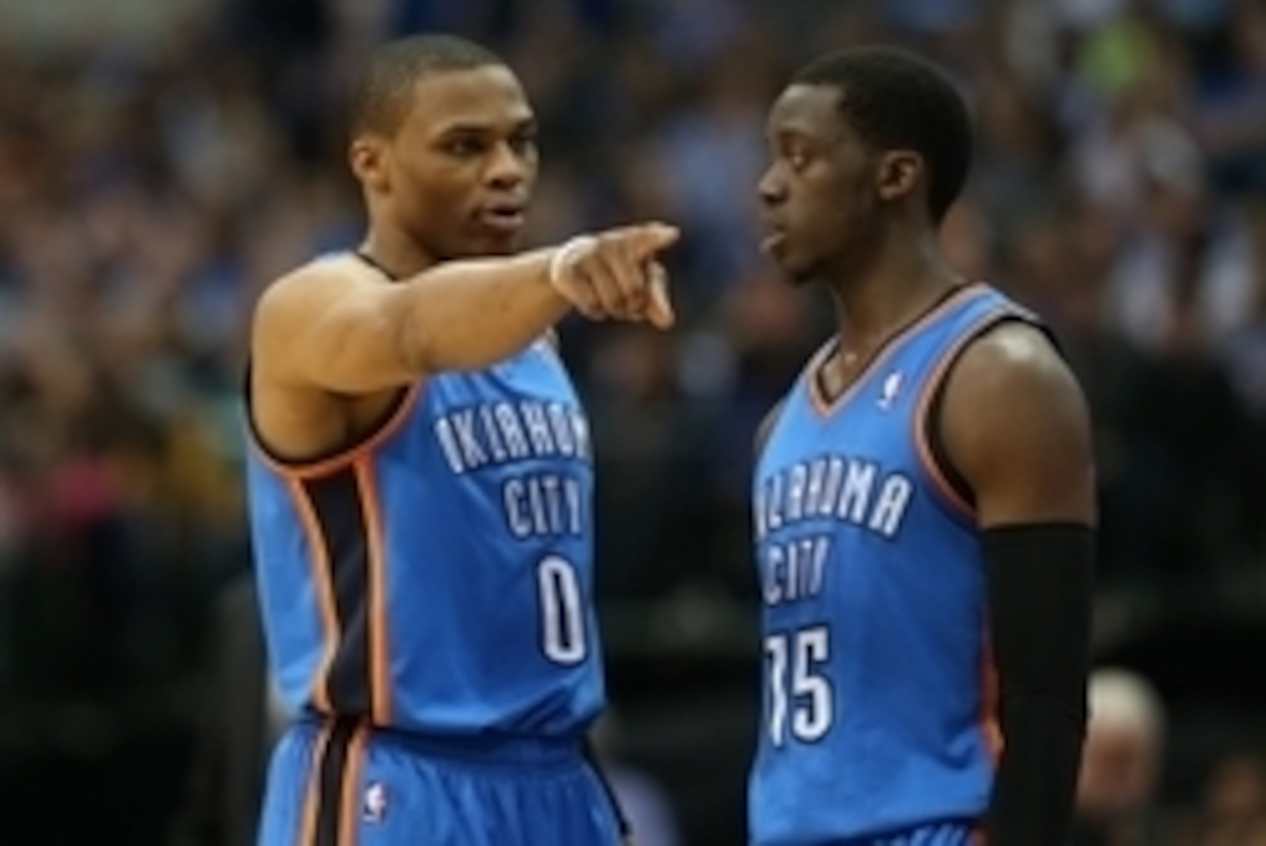 Mar 25, 2014; Dallas, TX, USA; Oklahoma City Thunder guard Russell Westbrook (0) talk with guard Reggie Jackson (15) during a timeout from the game  in the second quarter against the Dallas Mavericks at American Airlines Center. Mandatory Credit: Matthew 