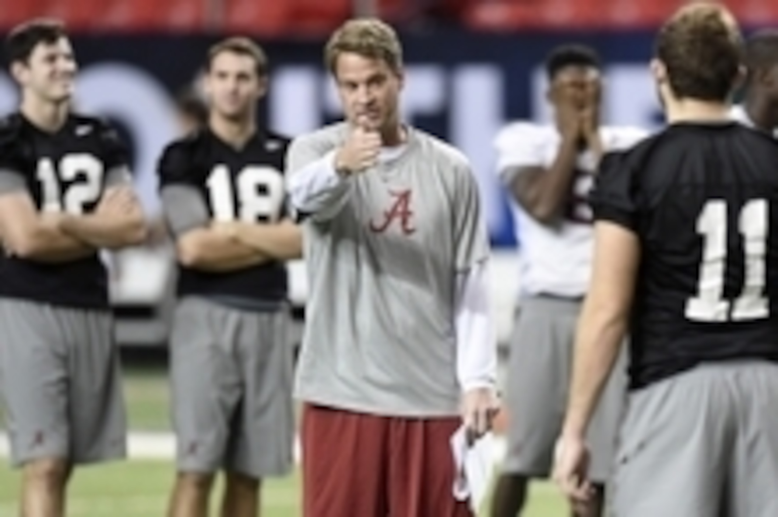 Dec 5, 2014; Atlanta, GA, USA;  Alabama Crimson Tide offensive coordinator Lane Kiffin works with quarterbacks and receivers during practice at the Georgia Dome. Alabama plays the Missouri Tigers in the SEC Championship on Saturday. Mandatory Credit: John