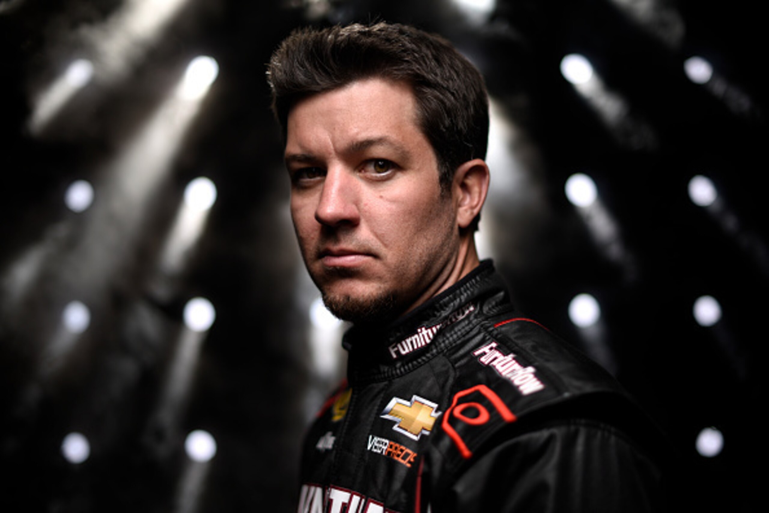 DAYTONA BEACH, FL - FEBRUARY 12: Martin Truex Jr., driver of the #78 Furniture Row Chevrolet, poses for a portrait during the 2015 NASCAR Media Day at Daytona International Speedway on February 12, 2015 in Daytona Beach, Florida. (Photo by Jared C. Tilt DAYTONA BEACH, FL - FEBRUARY 12: Martin Truex Jr., driver of the #78 Furniture Row Chevrolet, poses for a portrait during the 2015 NASCAR Media Day at Daytona International Speedway on February 12, 2015 in Daytona Beach, Florida. (Photo by Jared C. Tilt