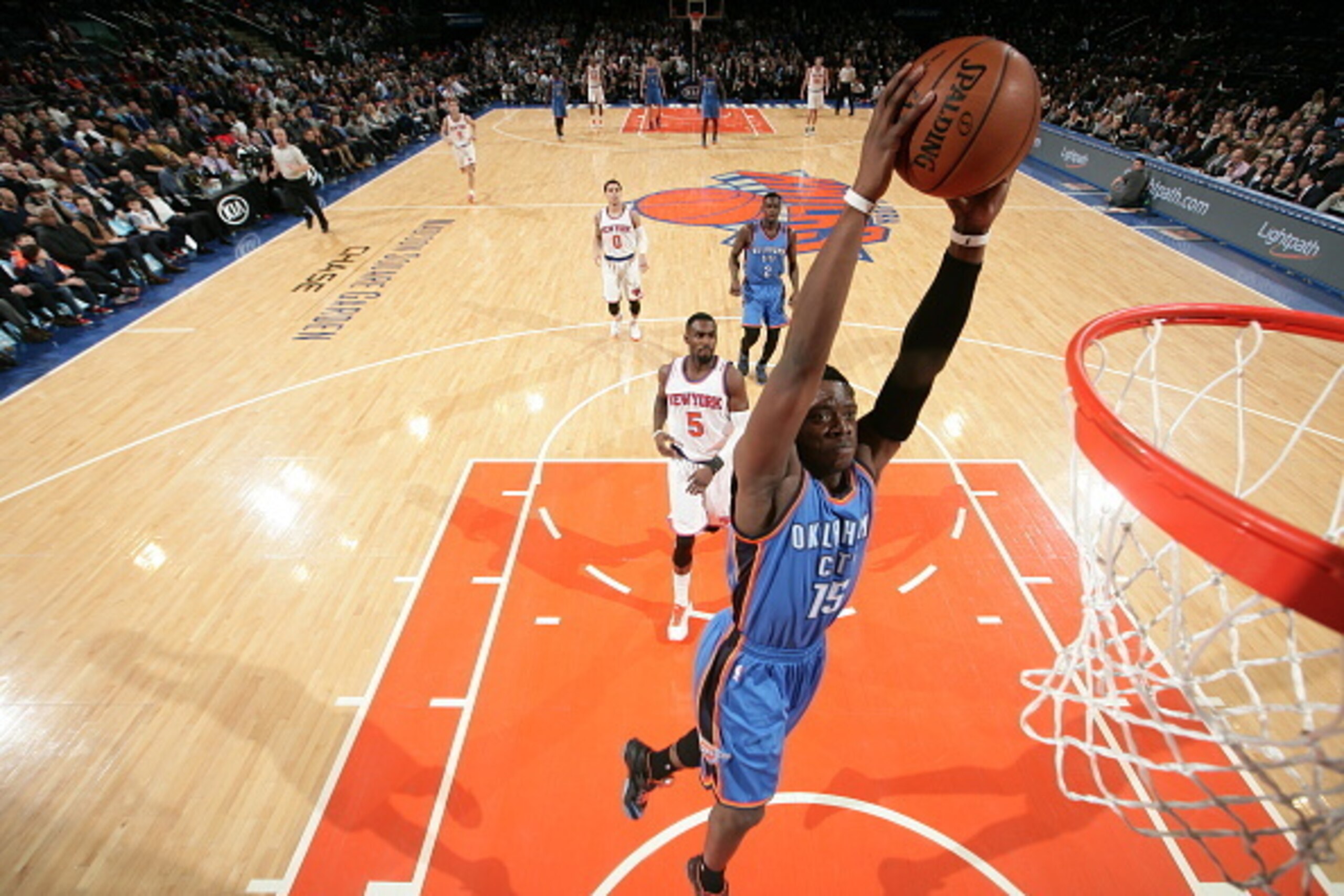 NEW YORK, NY - JANUARY 28:  Reggie Jackson #15 of the Oklahoma City Thunder dunks against the New York Knicks during the game on January 28, 2015 at Madison Square Garden in New York City, New York.  NOTE TO USER: User expressly acknowledges and agrees th