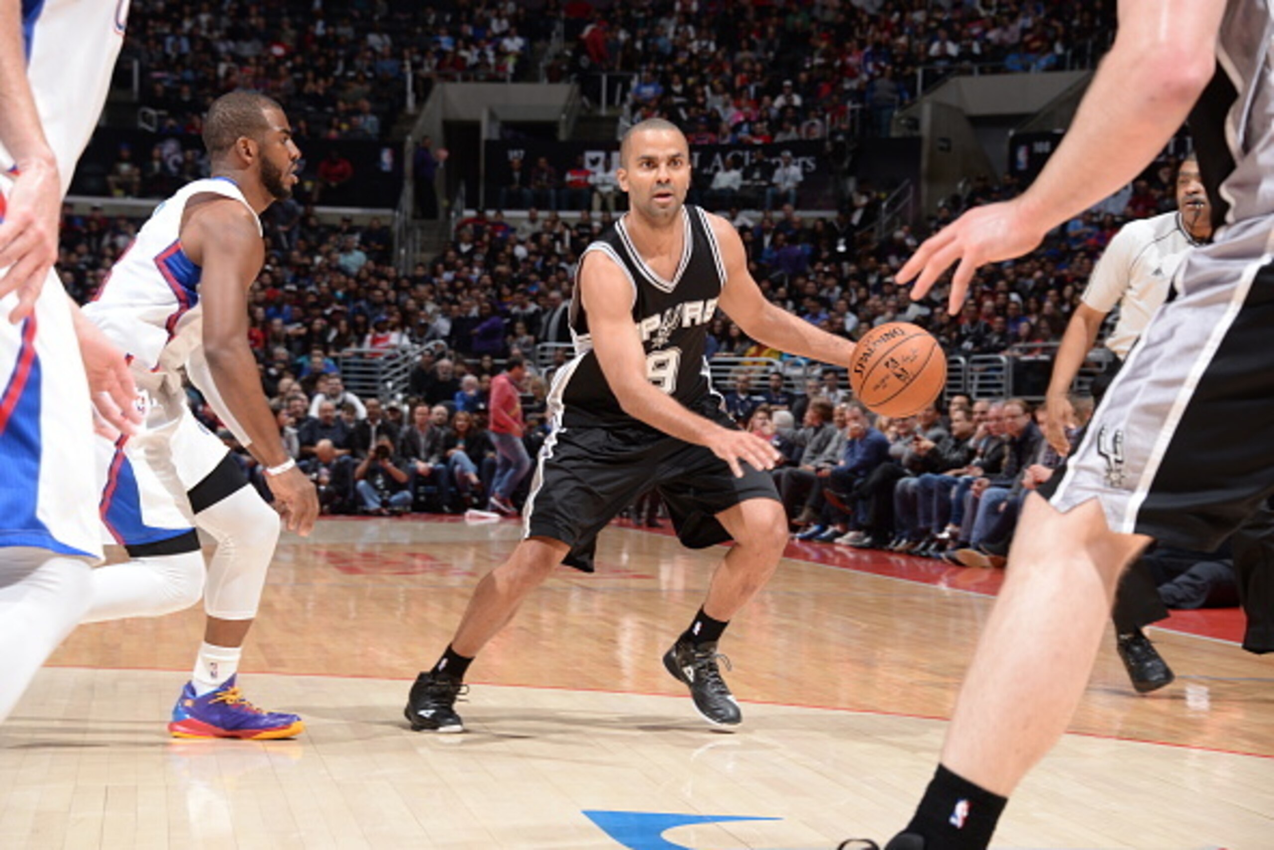 LOS ANGELES, CA - FEBRUARY 19: Tony Parker #9 of the San Antonio Spurs drives to the basket against the Los Angeles Clippers on February 19, 2015 at Staples Center in Los Angeles, California. NOTE TO USER: User expressly acknowledges and agrees that, by LOS ANGELES, CA - FEBRUARY 19: Tony Parker #9 of the San Antonio Spurs drives to the basket against the Los Angeles Clippers on February 19, 2015 at Staples Center in Los Angeles, California. NOTE TO USER: User expressly acknowledges and agrees that, by